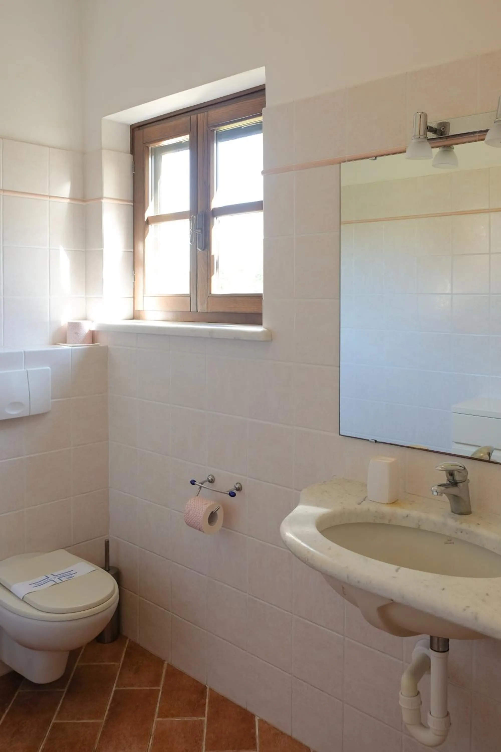 Bathroom in Agriturismo biologico Bulichella