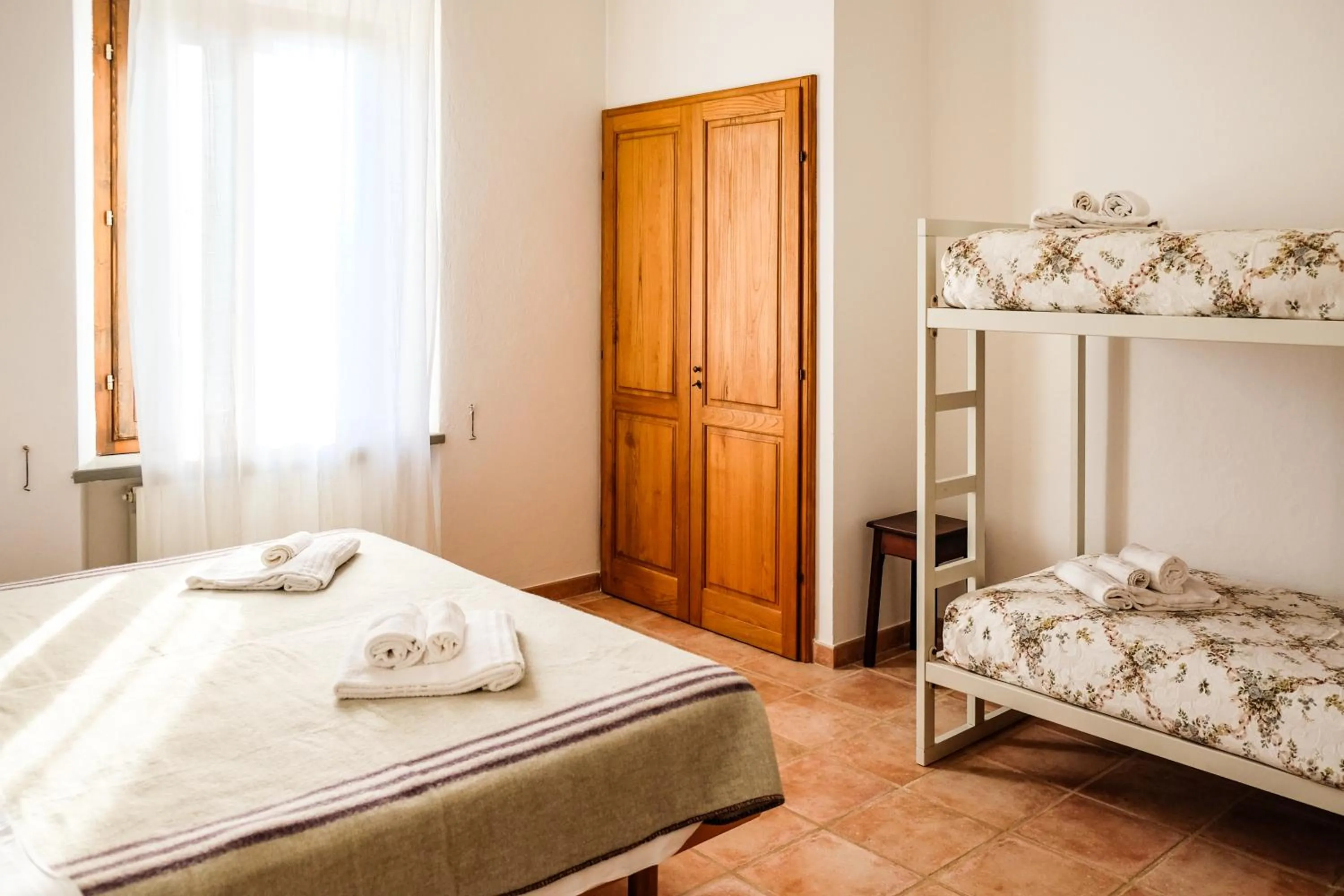 Bedroom, Bed in Agriturismo biologico Bulichella