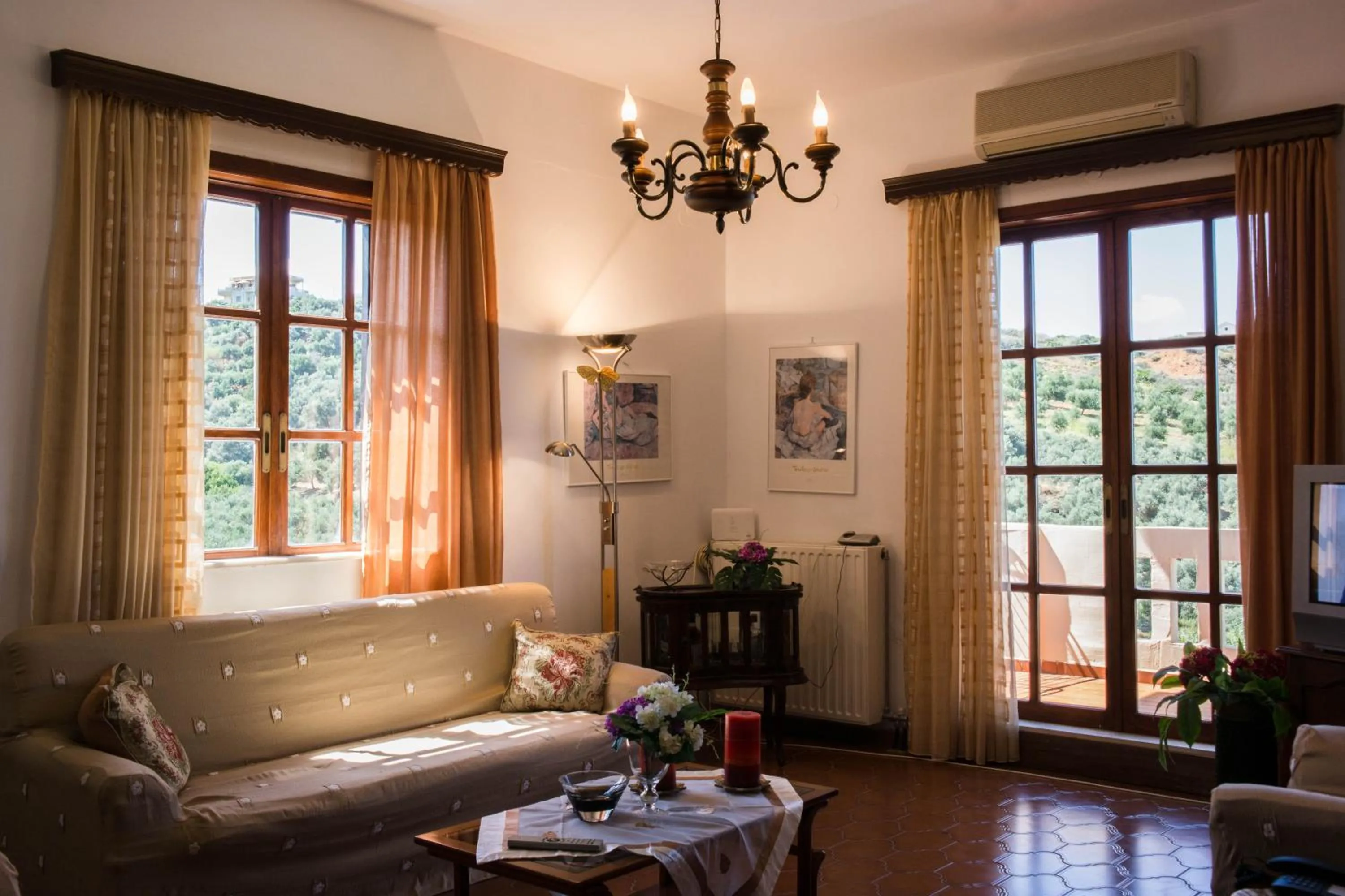 Communal lounge/ TV room in Alexandra Villa Stalos