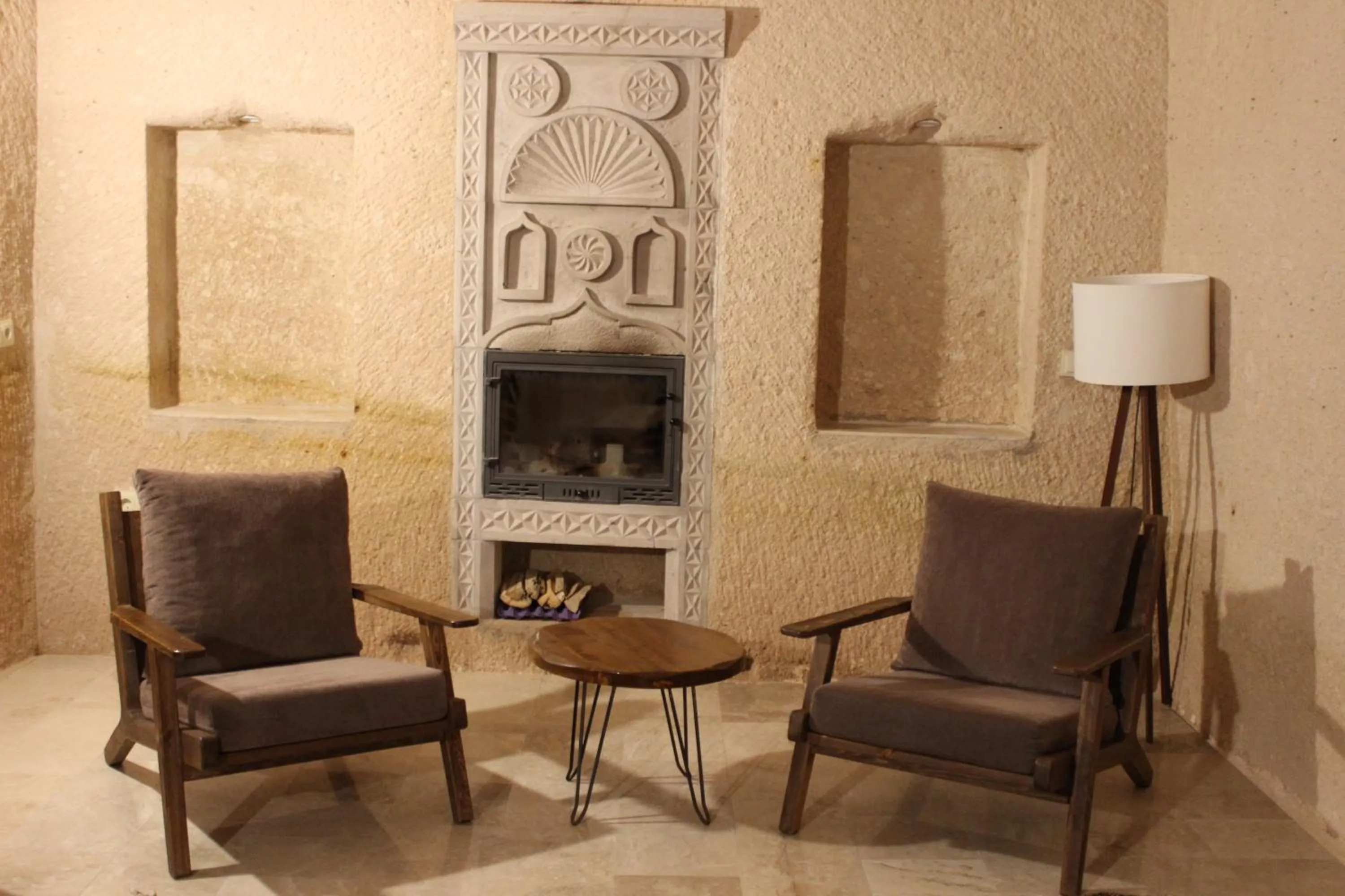 Seating area in Helike Cave Suites