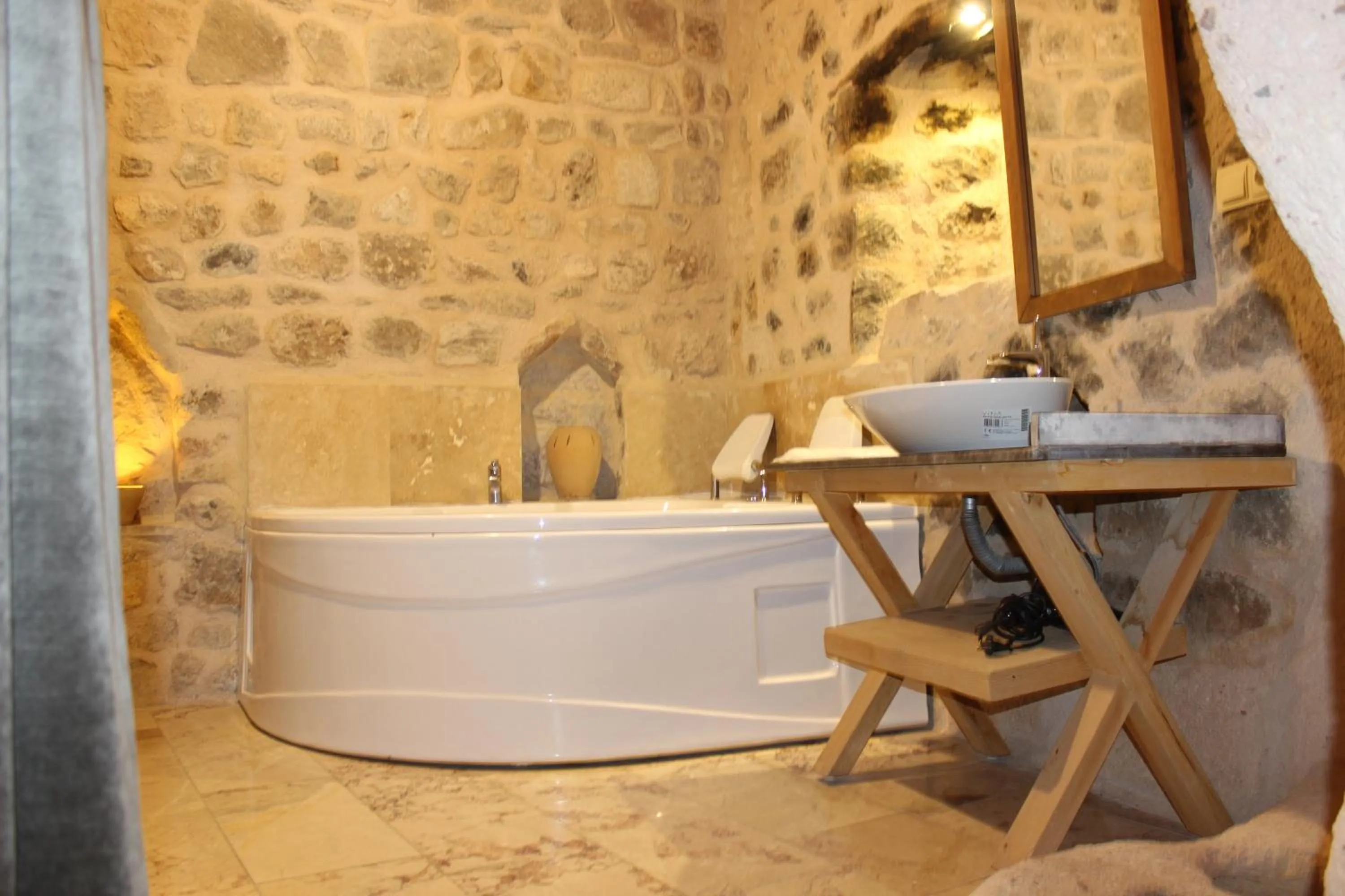 Hot Tub in Helike Cave Suites