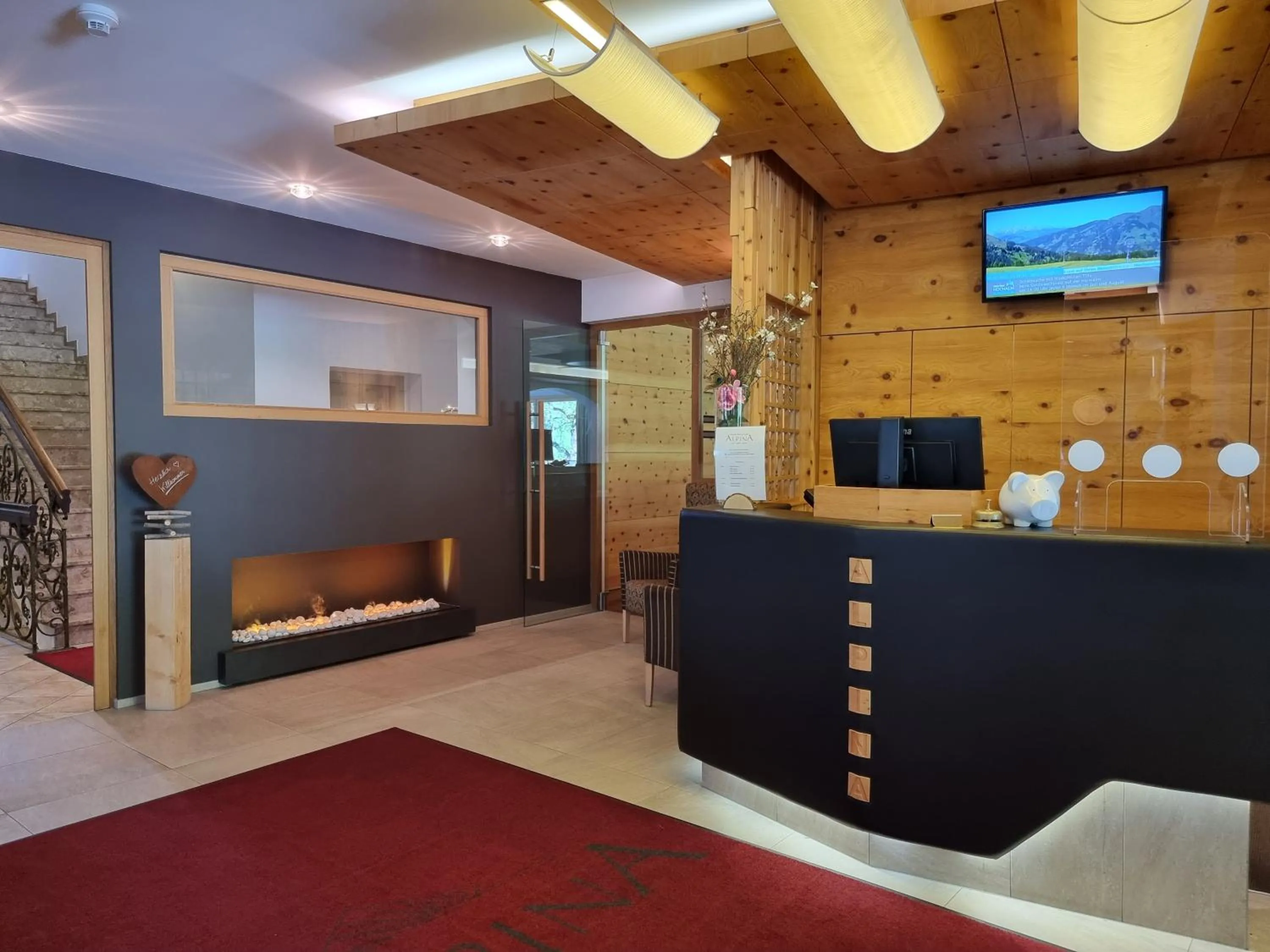 Lobby or reception in Hotel Alpina