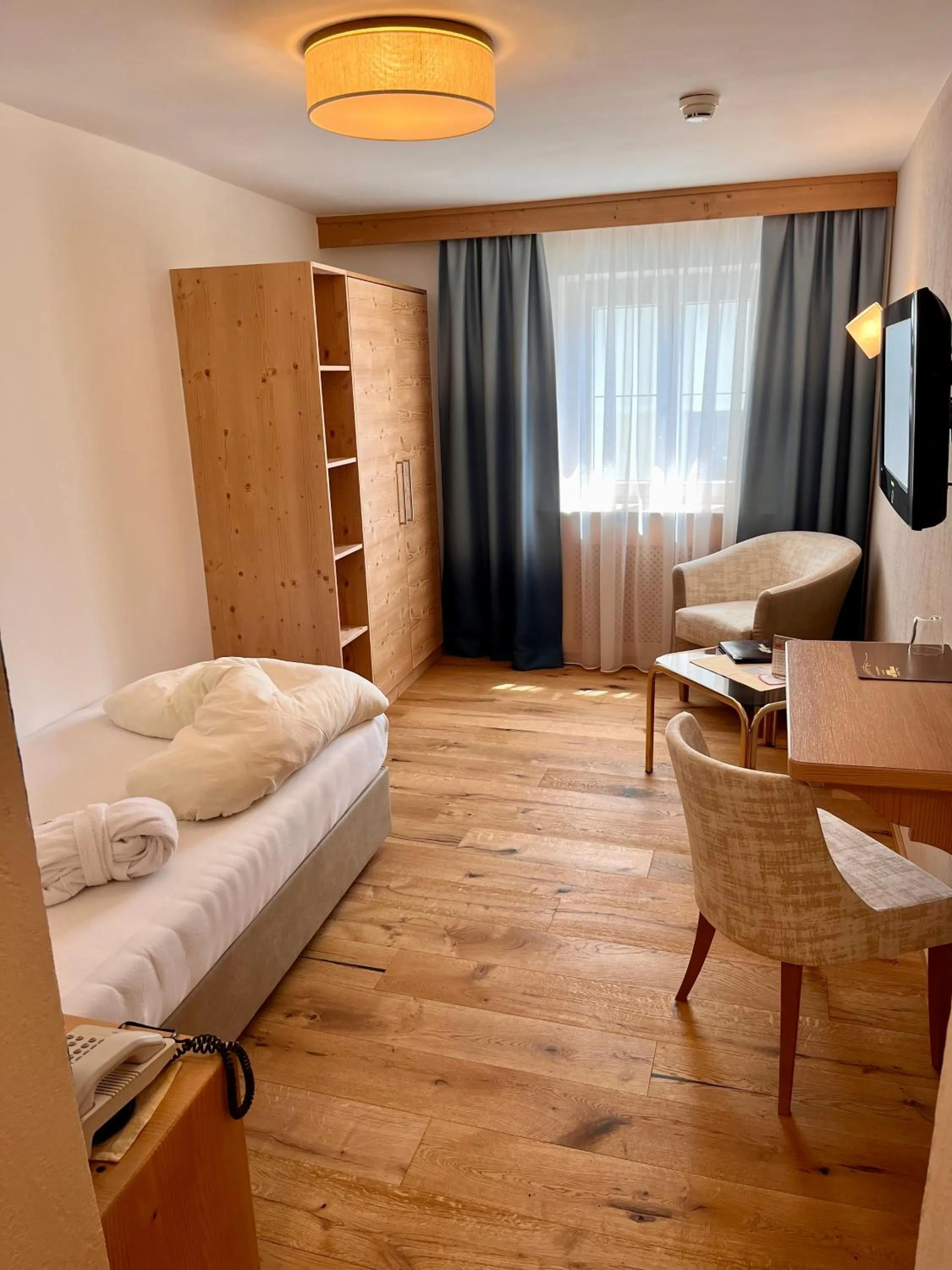 Photo of the whole room, Bed in Beauty & Wellness Hotel Tirolerhof