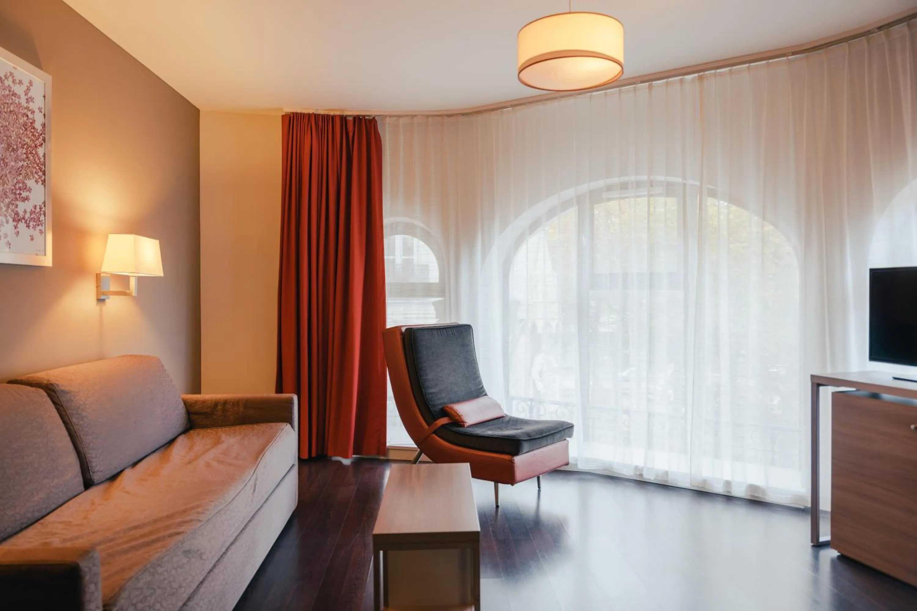 Living room in Comfort Aparthotel Saint-Etienne