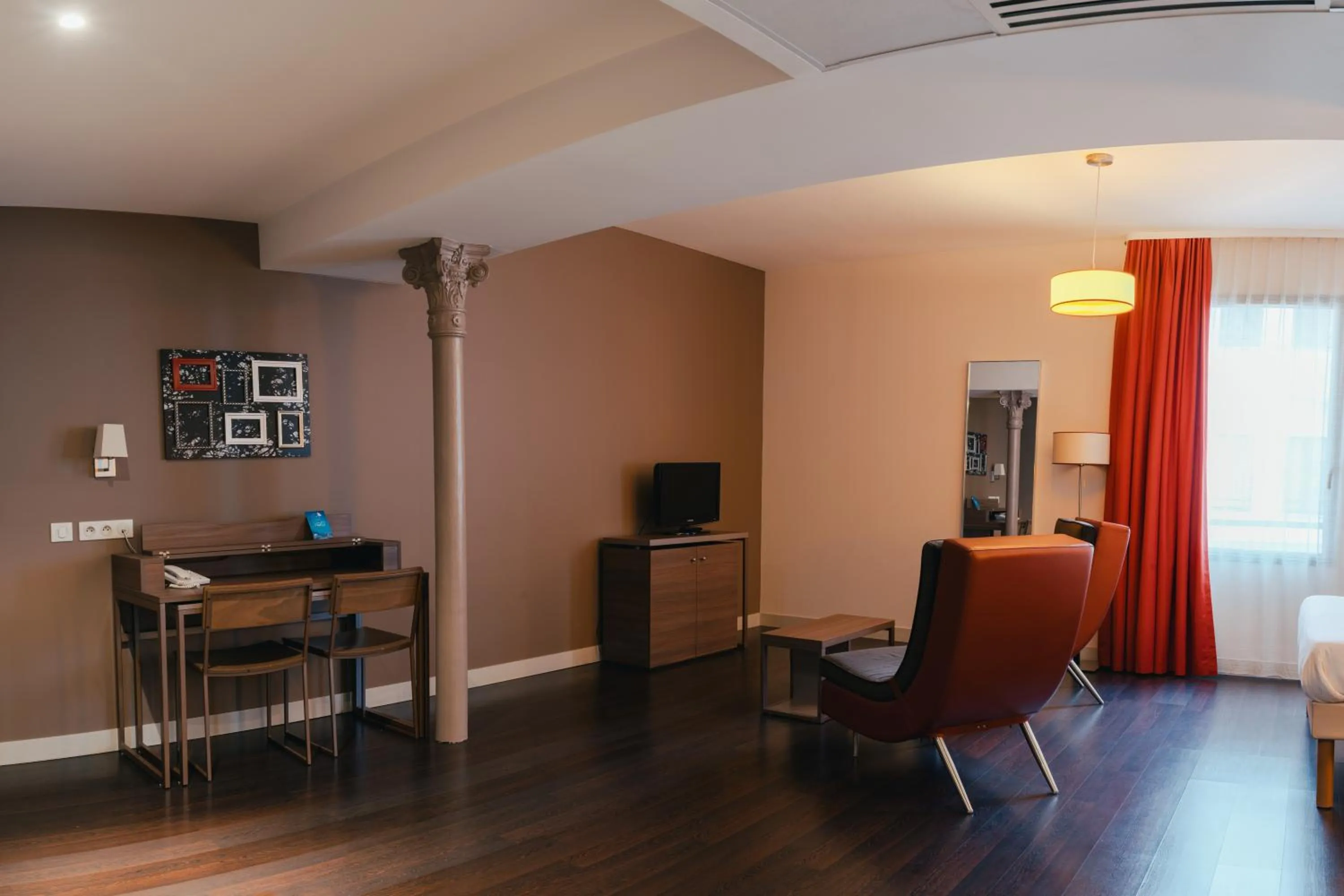 Living room in Comfort Aparthotel Saint-Etienne