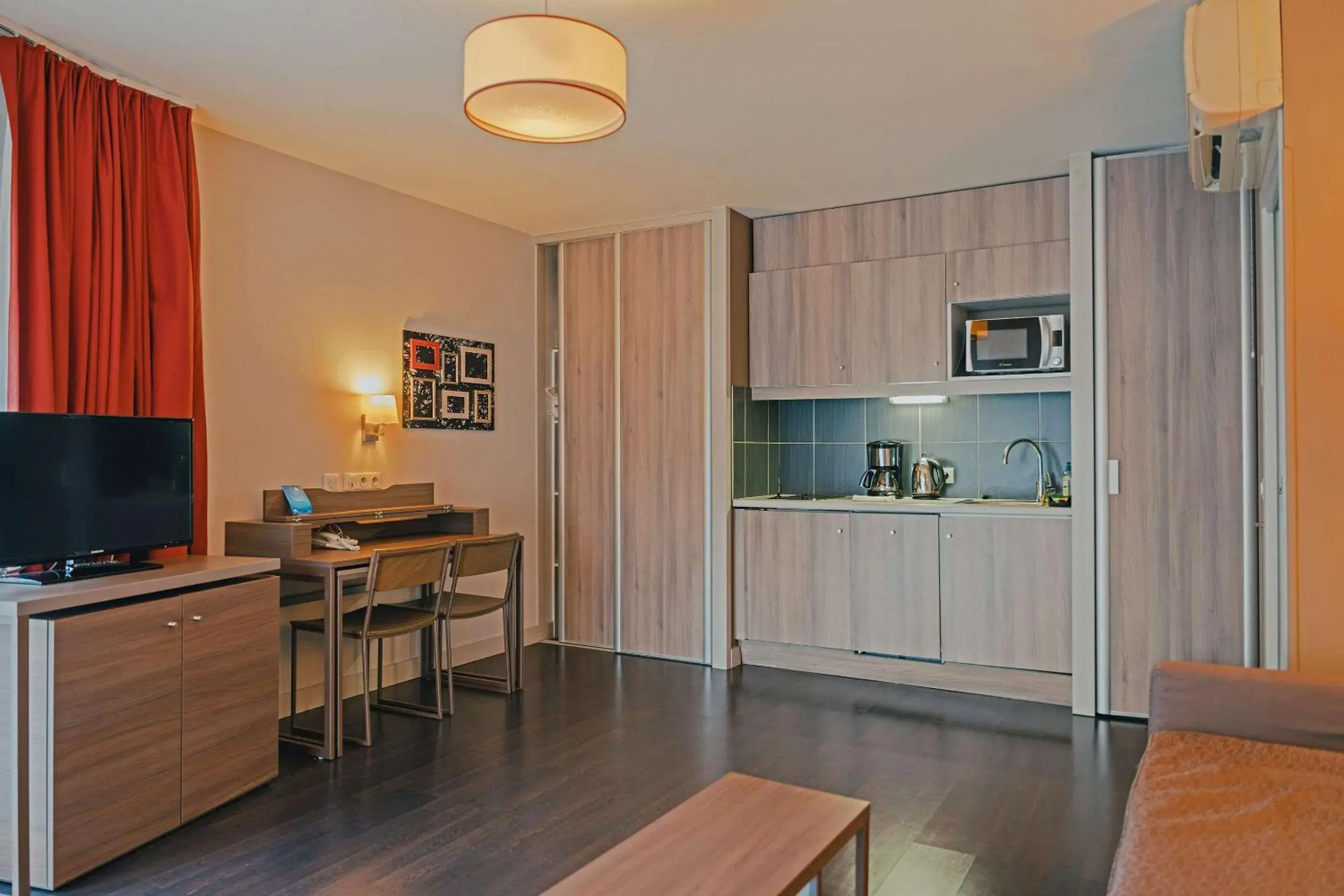 Bedroom in Comfort Aparthotel Saint-Etienne Bedroom in Comfort Aparthotel Saint-Etienne