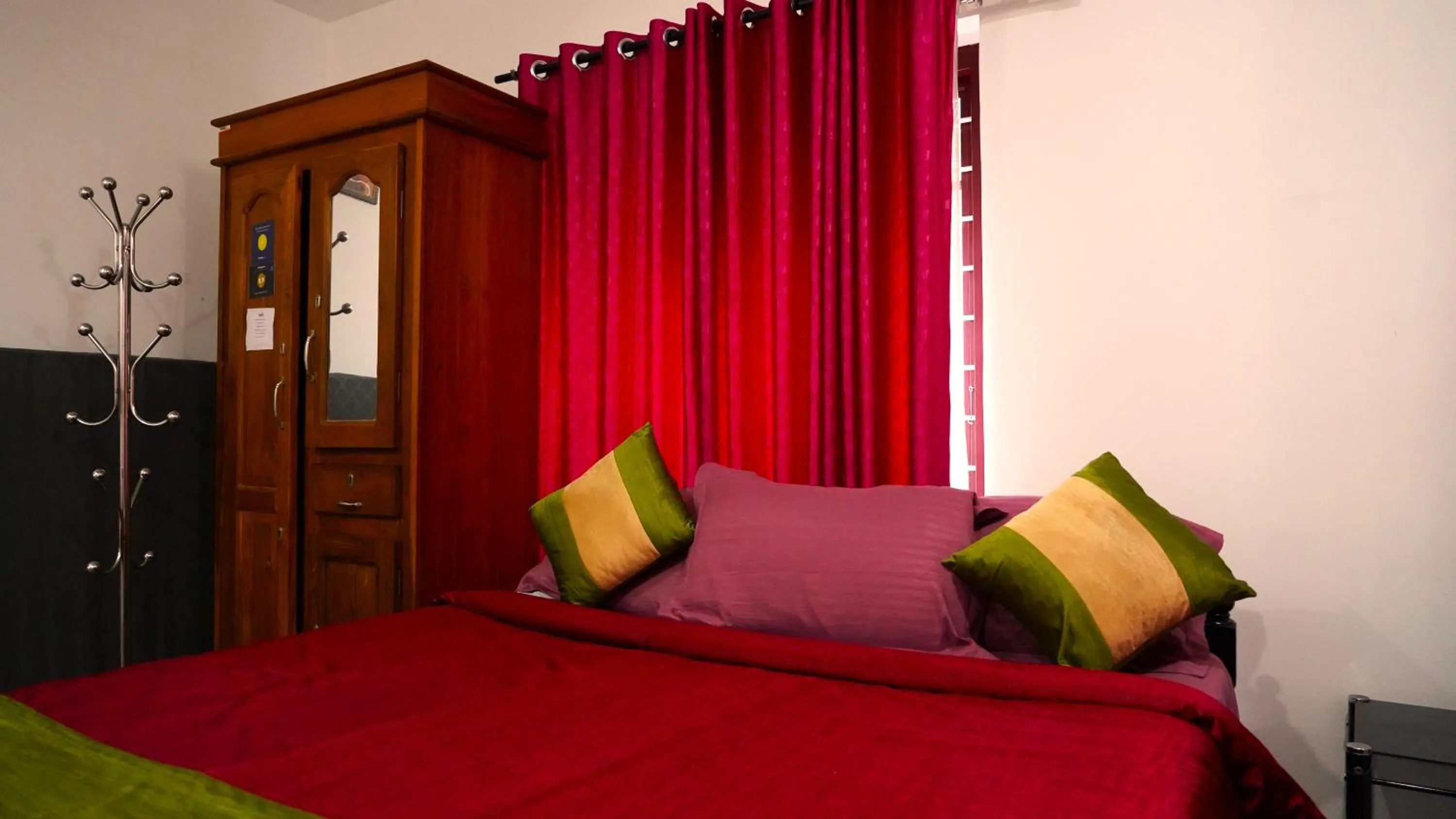 Bed in Arabian Nights Munnar Pool Villa