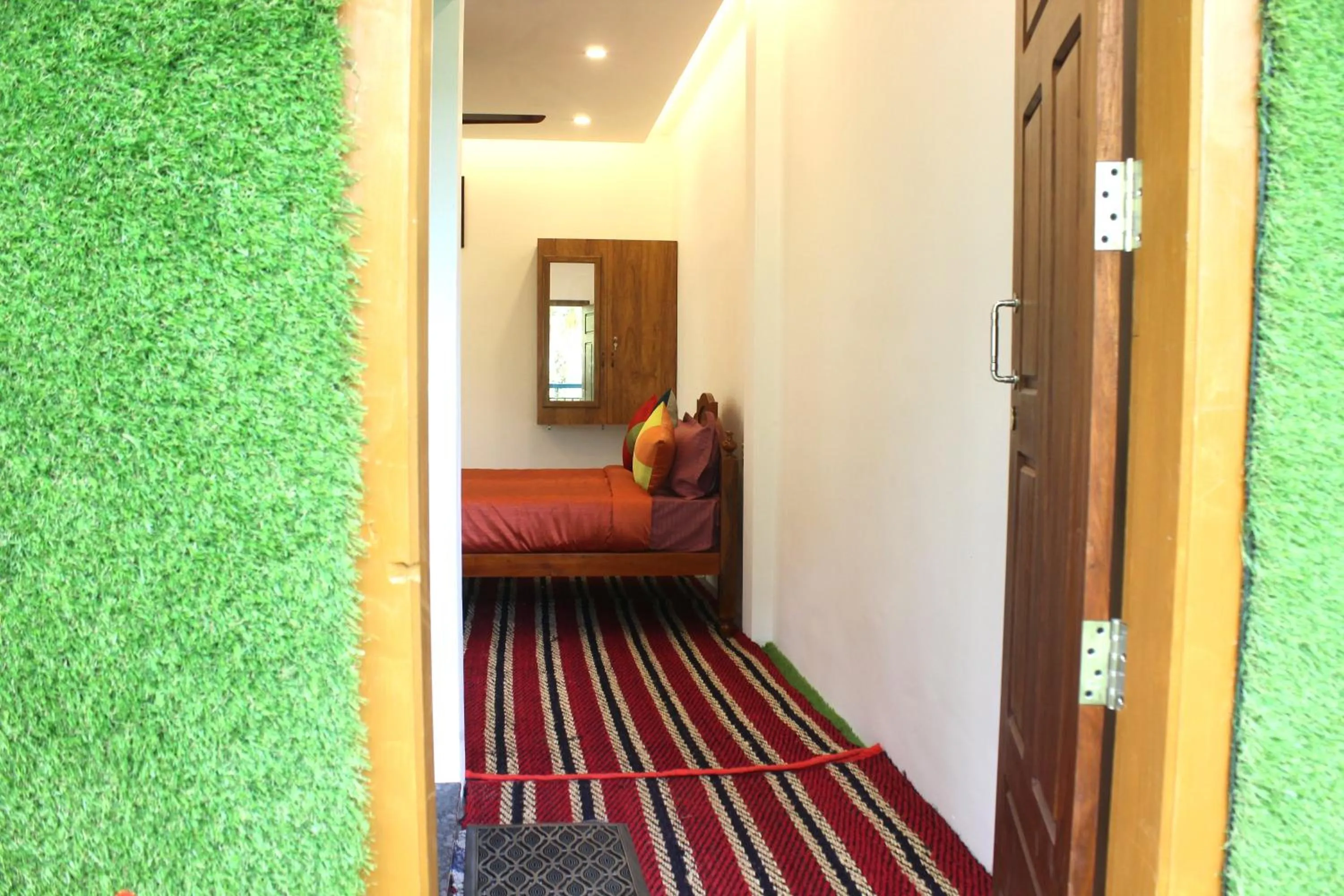 Bed in Arabian Nights Munnar Pool Villa