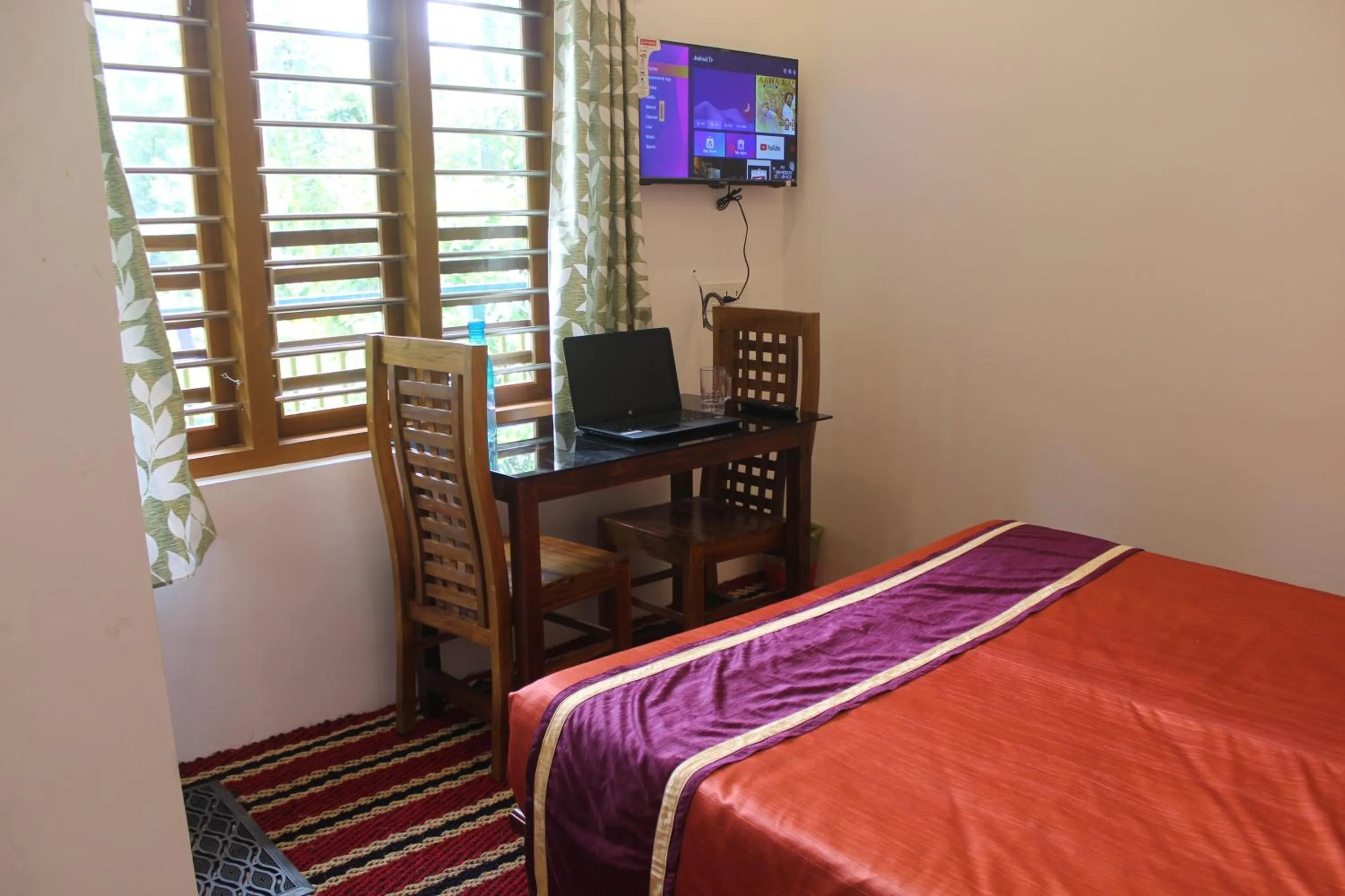 Bed in Arabian Nights Munnar Pool Villa