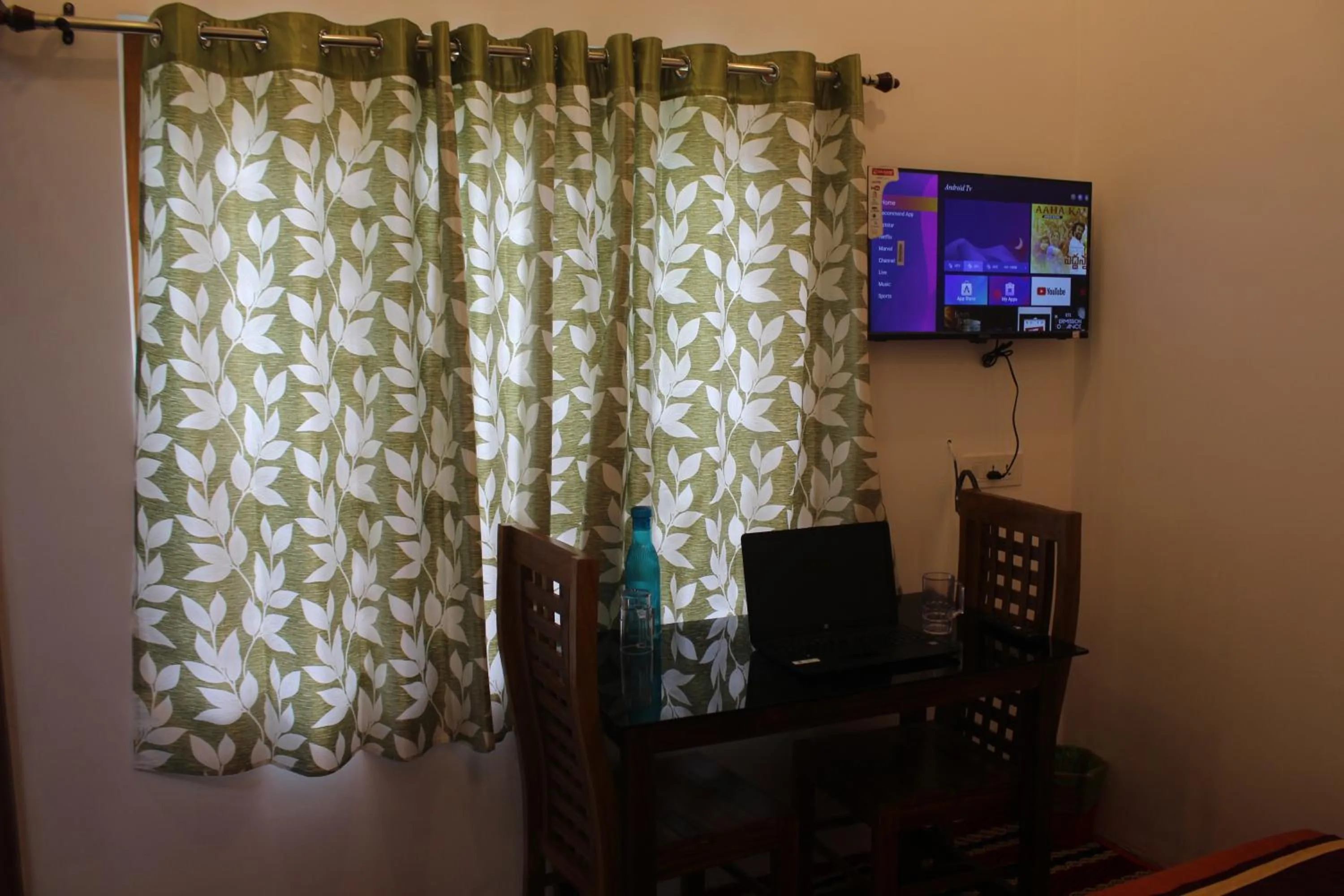 TV and multimedia in Arabian Nights Munnar Pool Villa