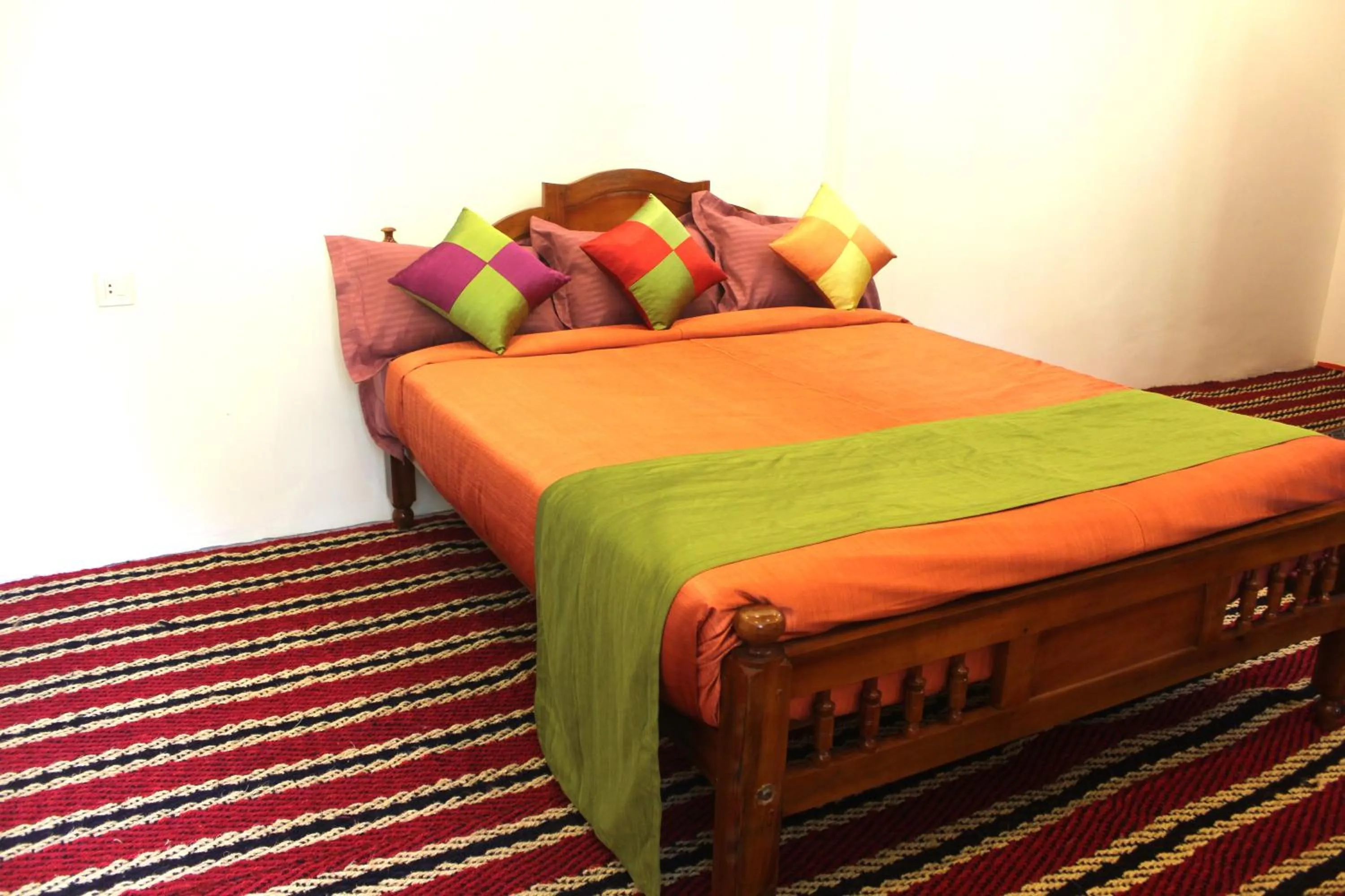 Bed in Arabian Nights Munnar Pool Villa