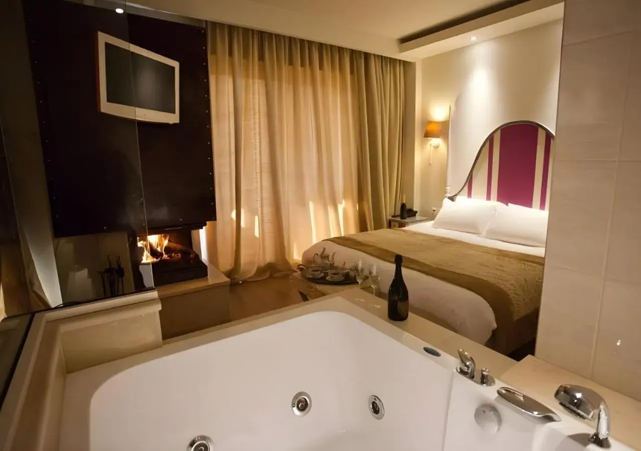 Hot Tub, Bed in Litohoro Olympus Resort Villas & Spa Hot Tub, Bed in Litohoro Olympus Resort Villas & Spa