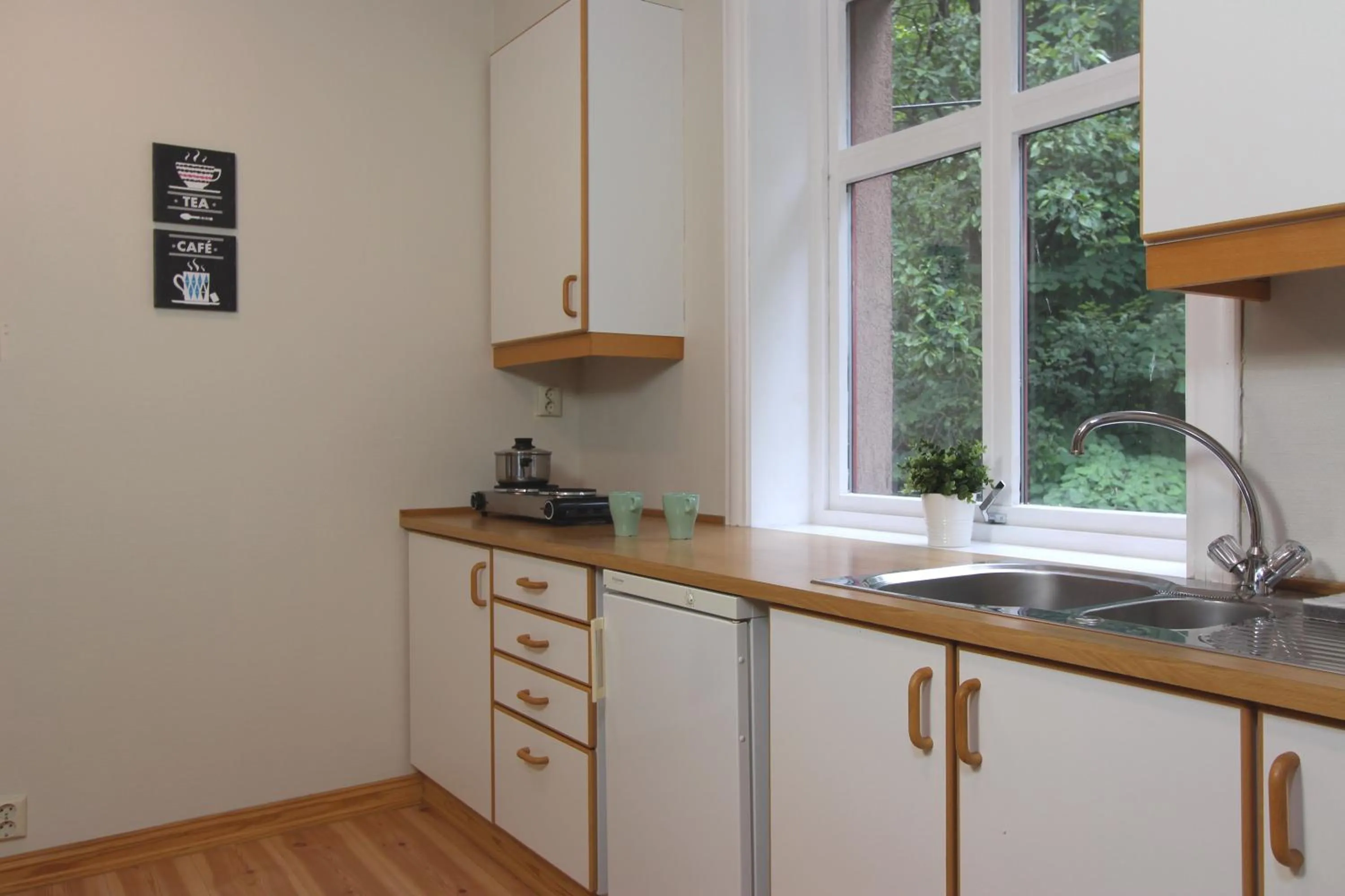 Kitchen or kitchenette in Slottet Apartments