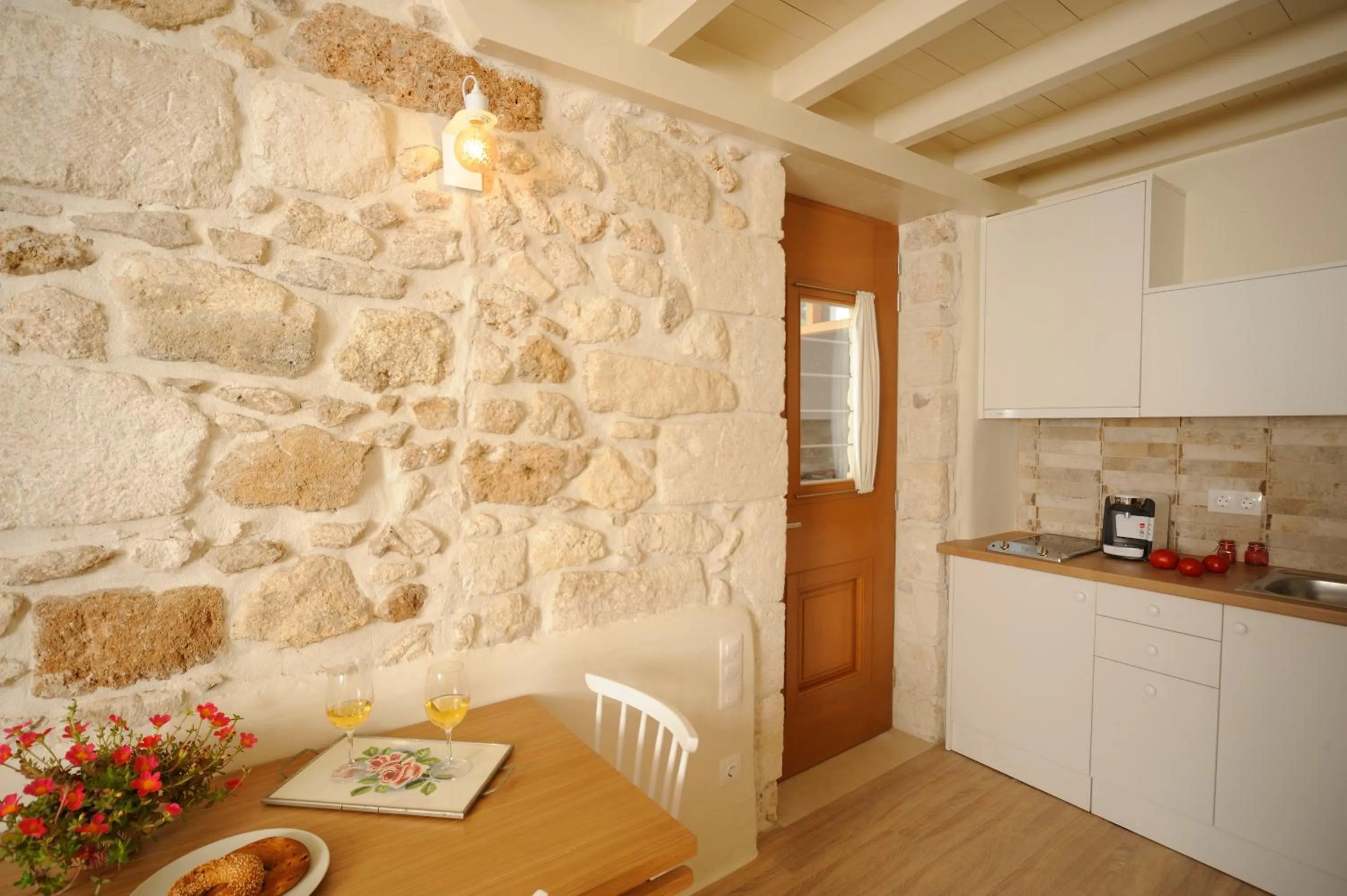 Kitchen or kitchenette in Veranda Rossa Suites