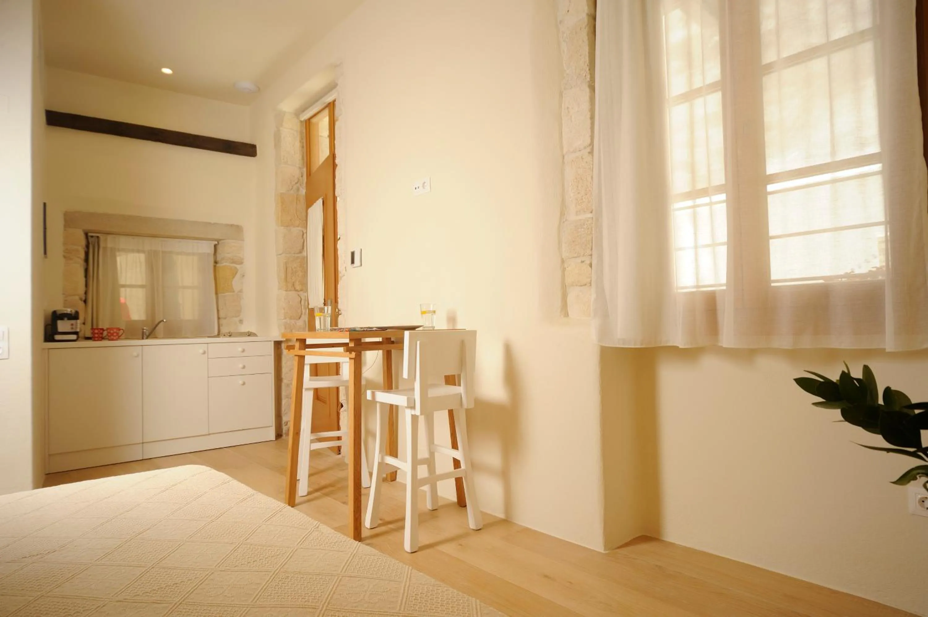 Kitchen or kitchenette in Veranda Rossa Suites