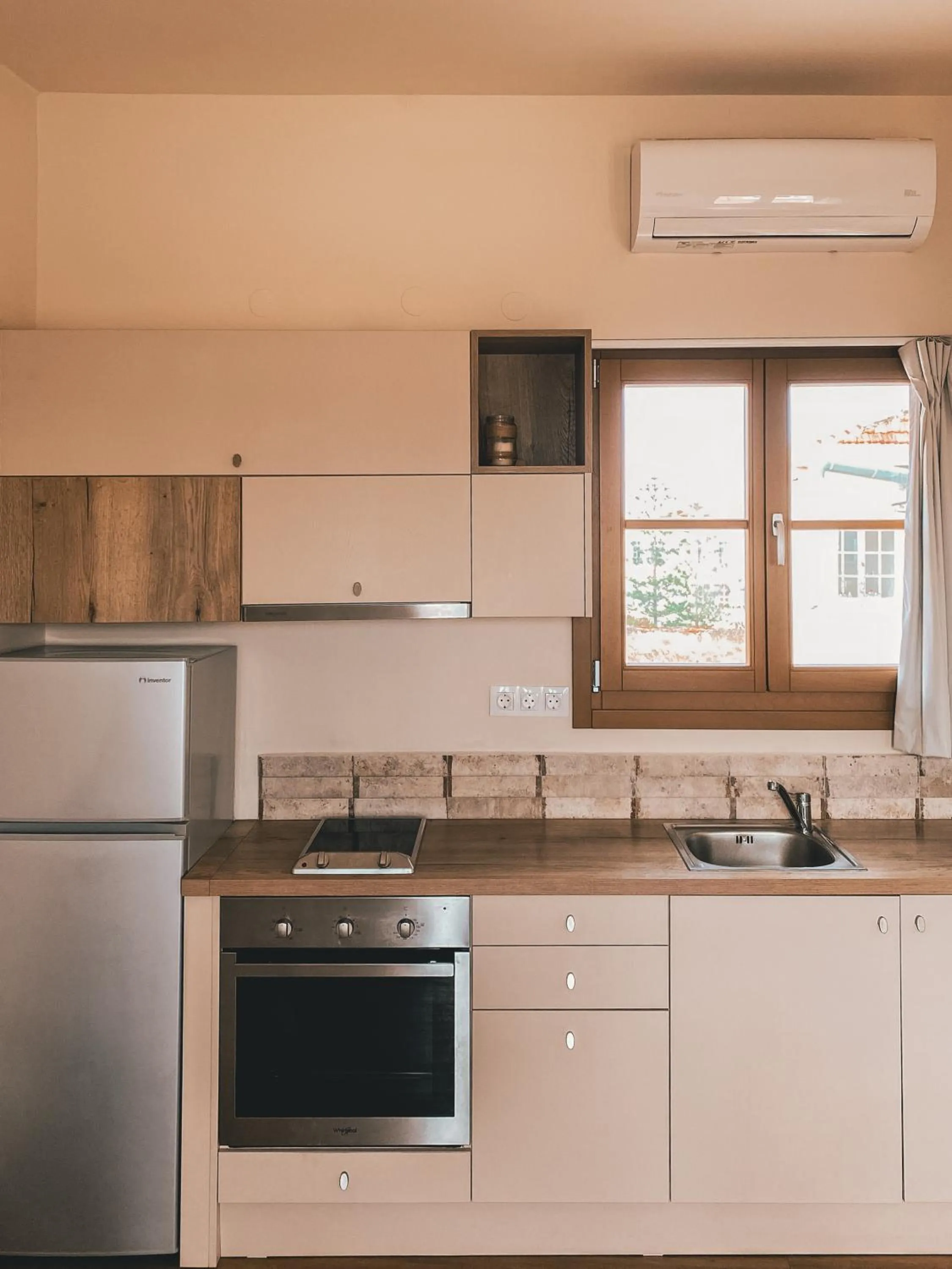 Kitchen or kitchenette in Veranda Rossa Suites