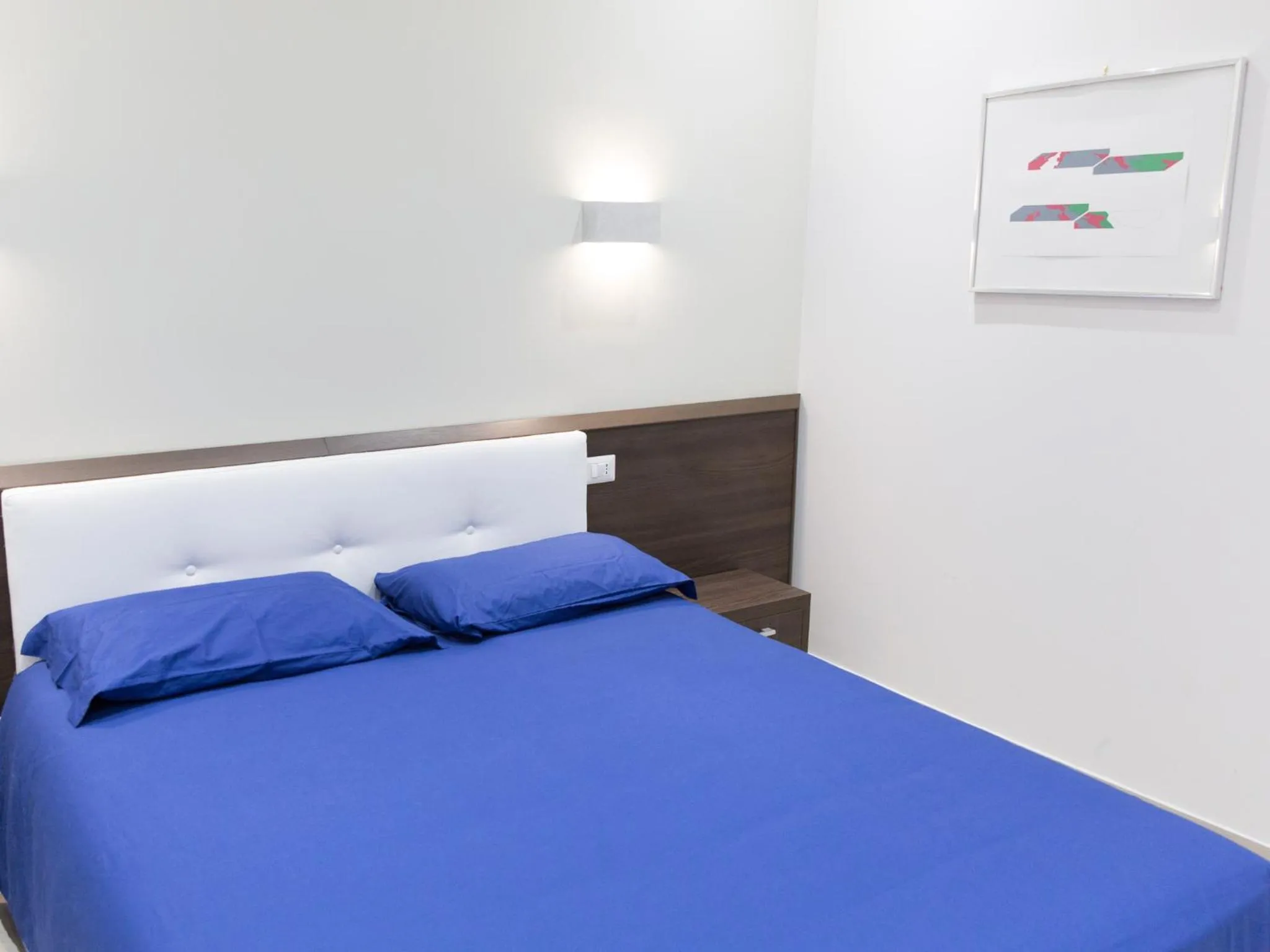 Bed in Venustas Roma Hotel