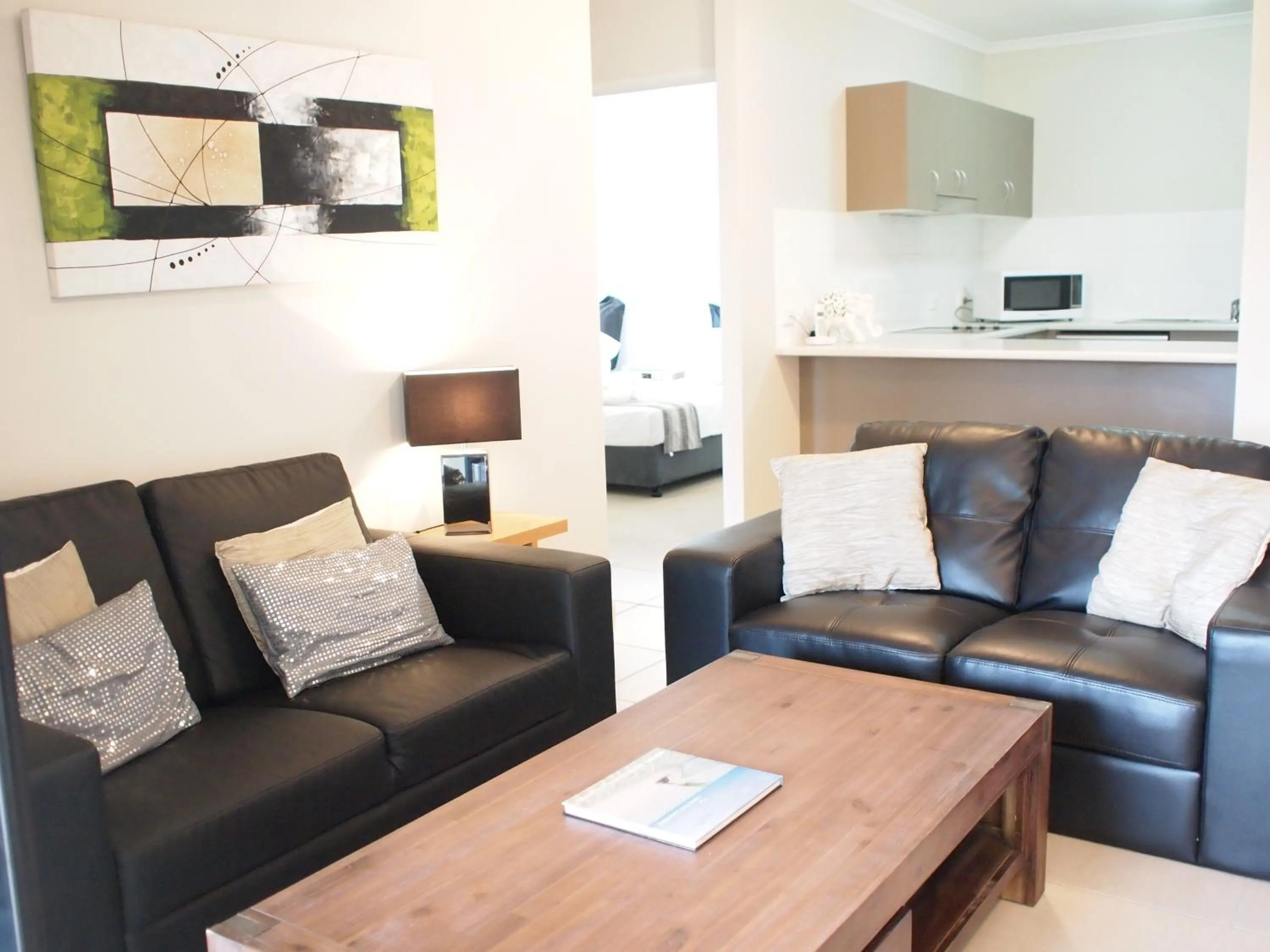 Seating area in Edge Apartments Cairns