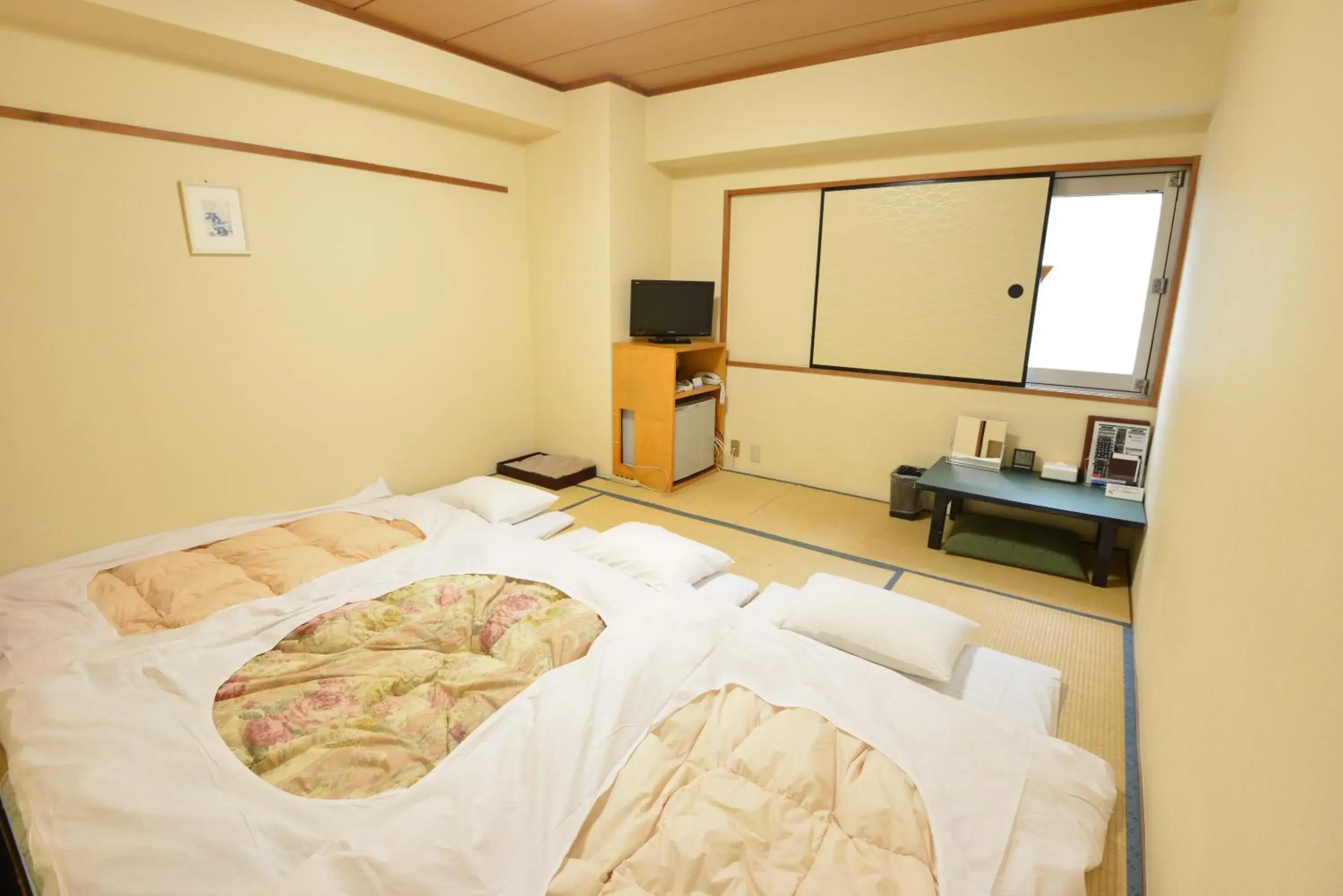 Bed in Hotel Marutani Bed in Hotel Marutani