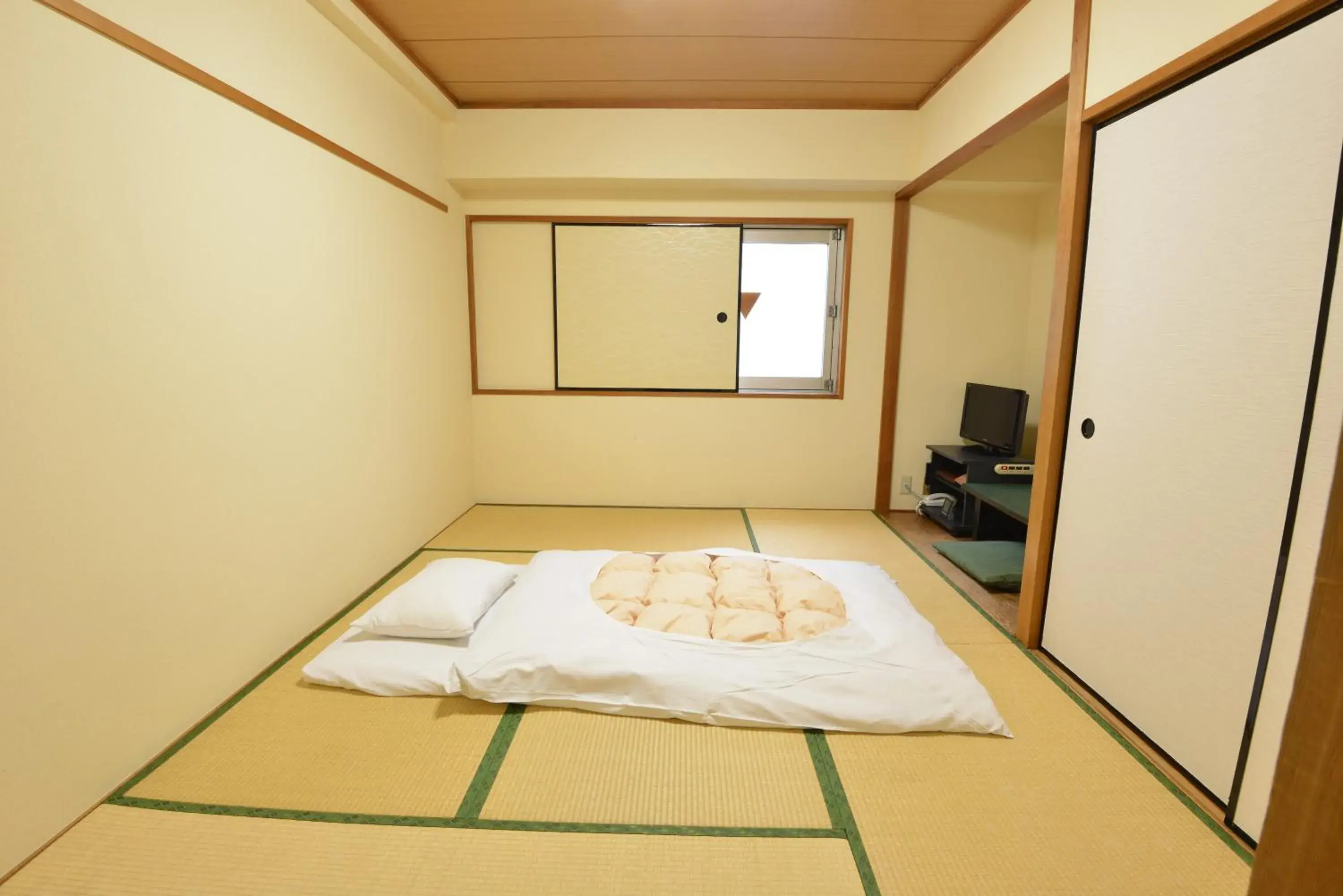 Bed in Hotel Marutani Bed in Hotel Marutani