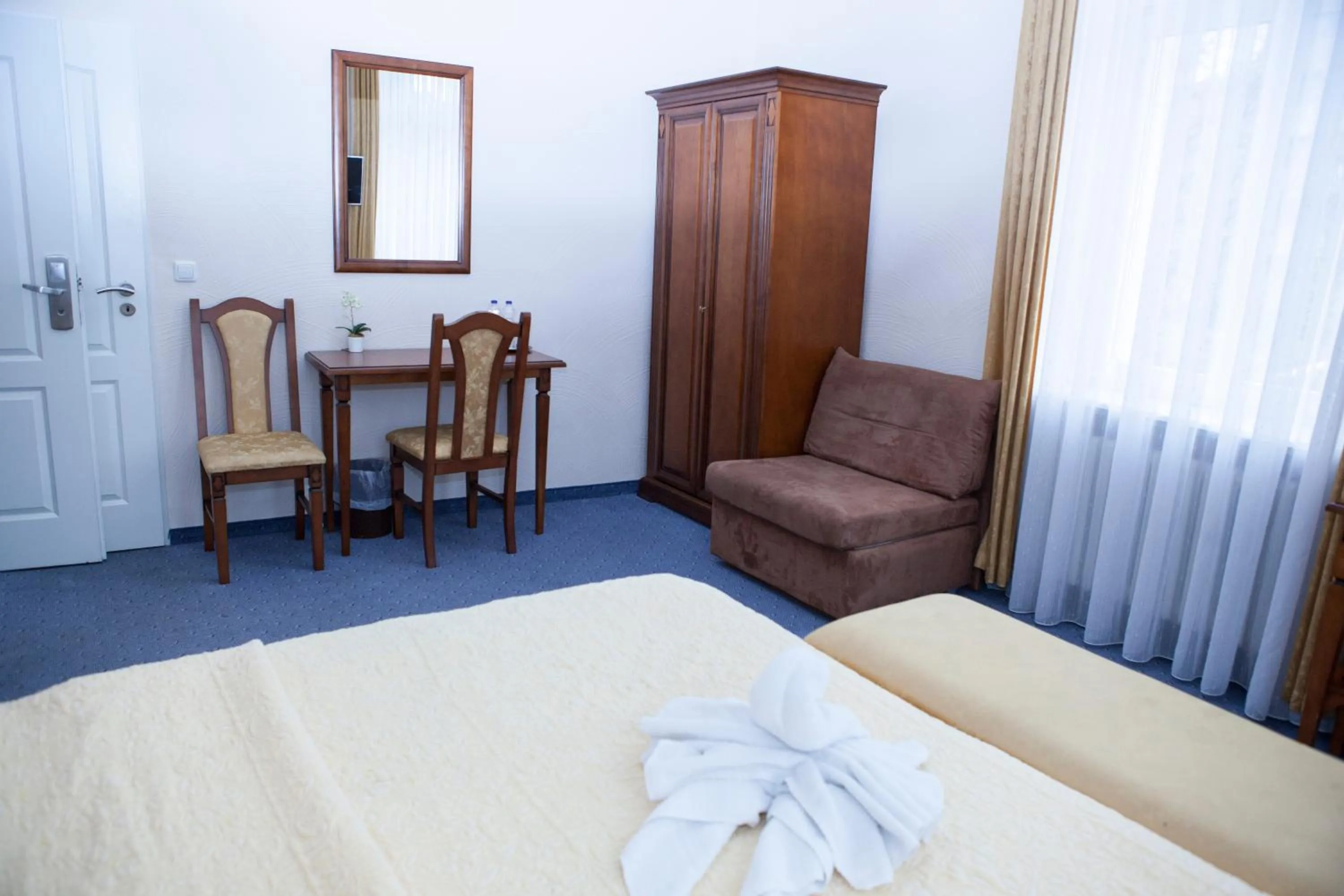 Seating area, Bed in Hotel Baden