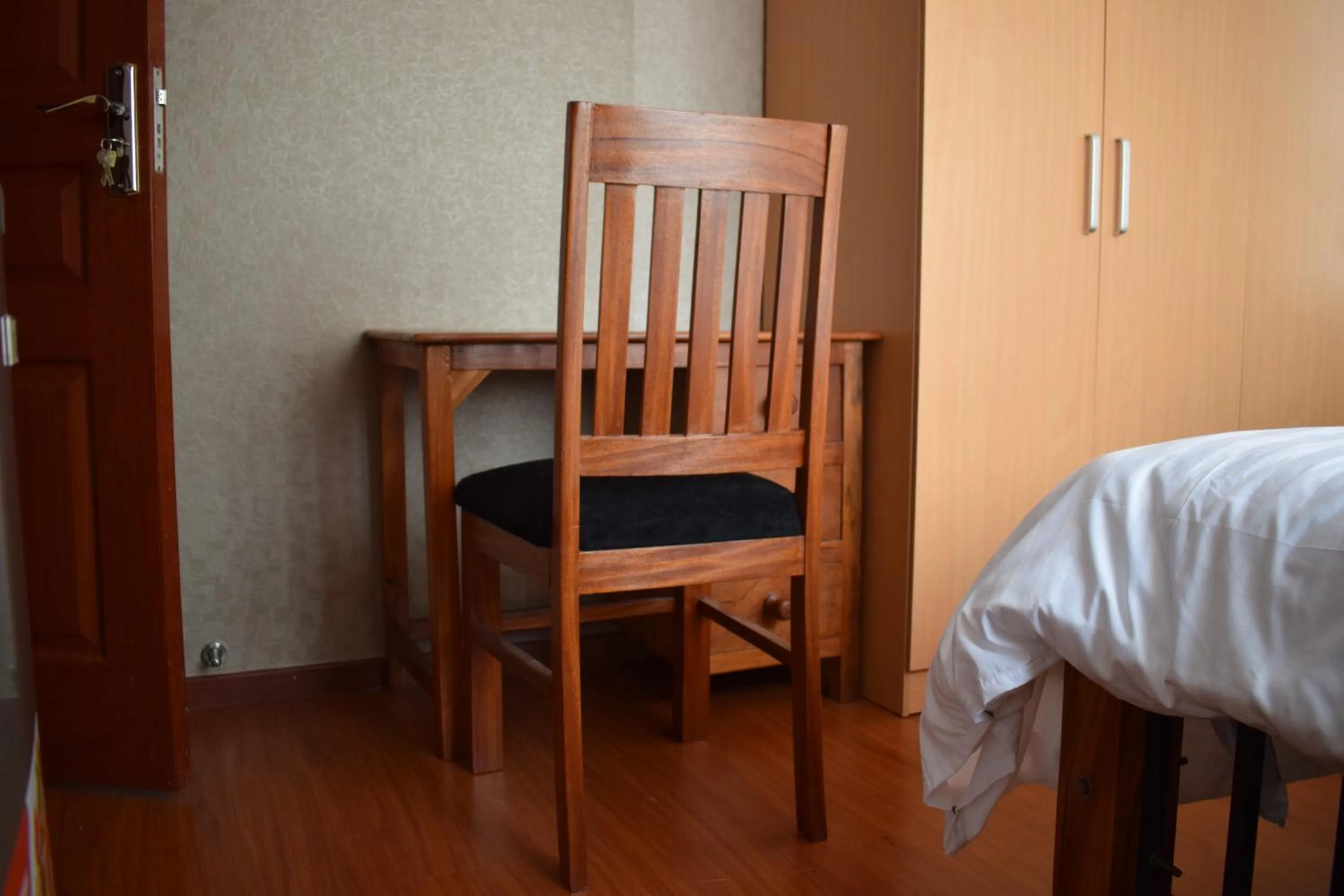 Bed in Covitech Apartments