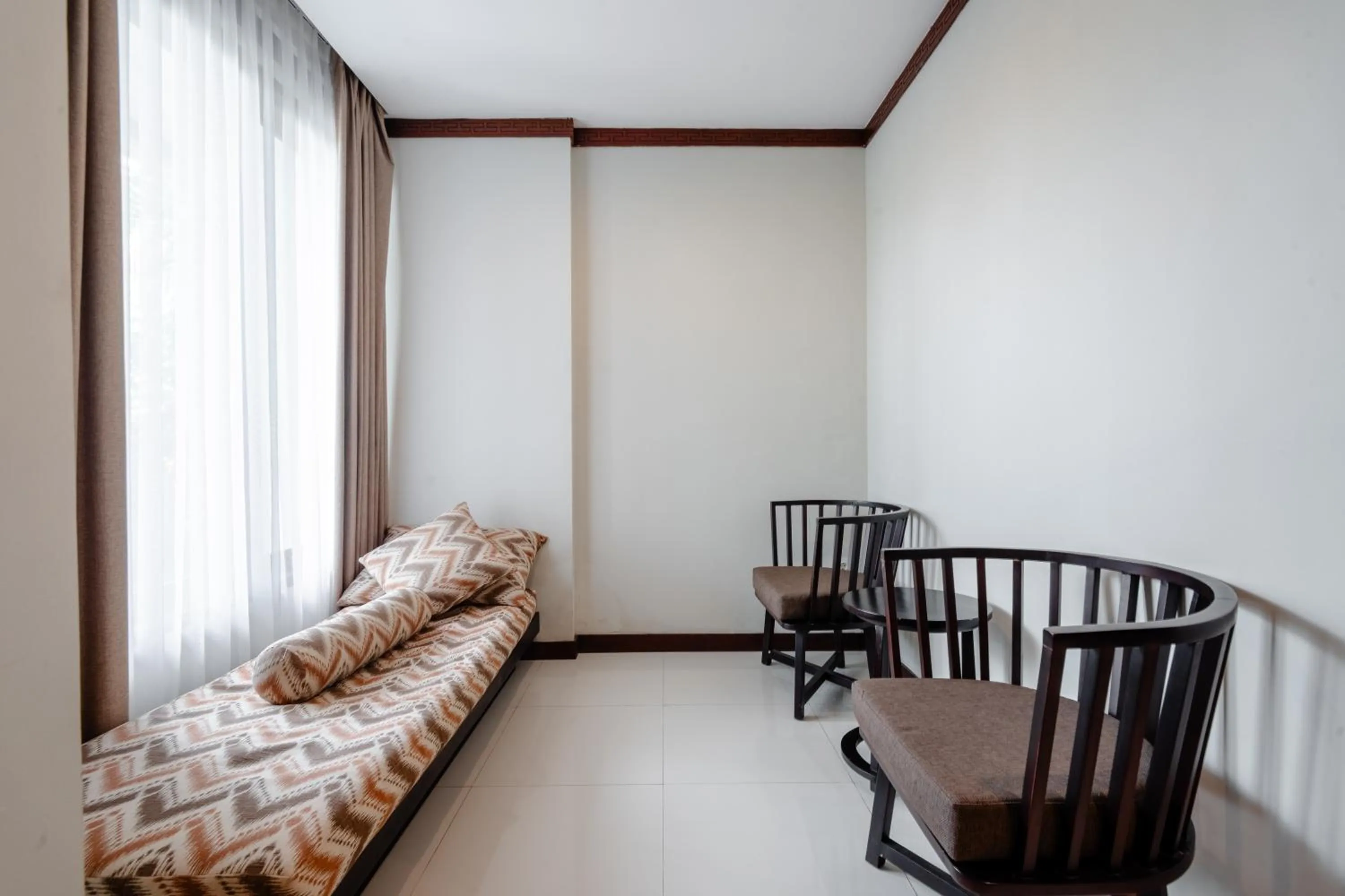 Seating area, Bed in djabu Seminyak Hotel