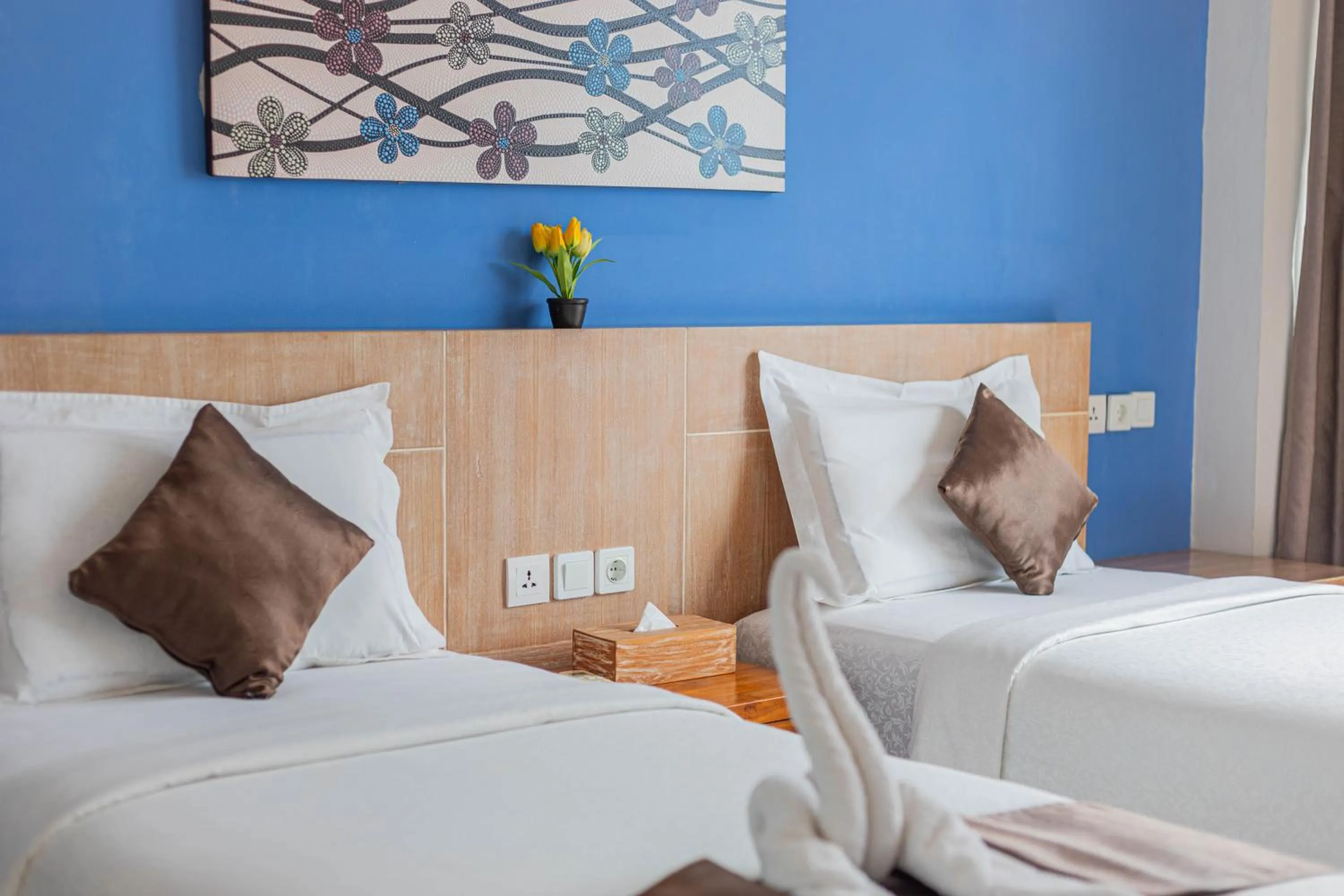 Bed in The Tanis Beach Resort Nusa Lembongan