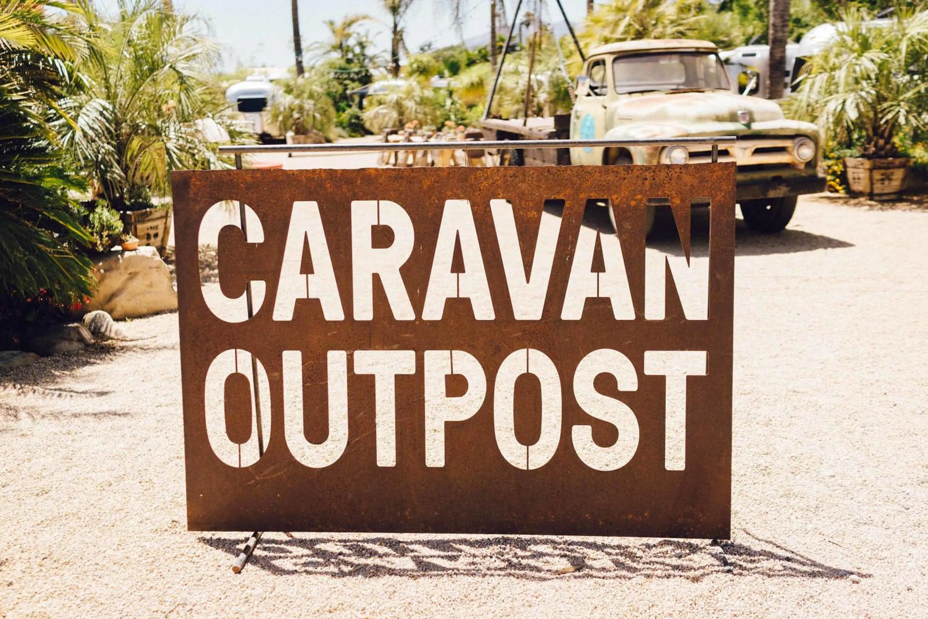 Property logo or sign in Caravan Outpost