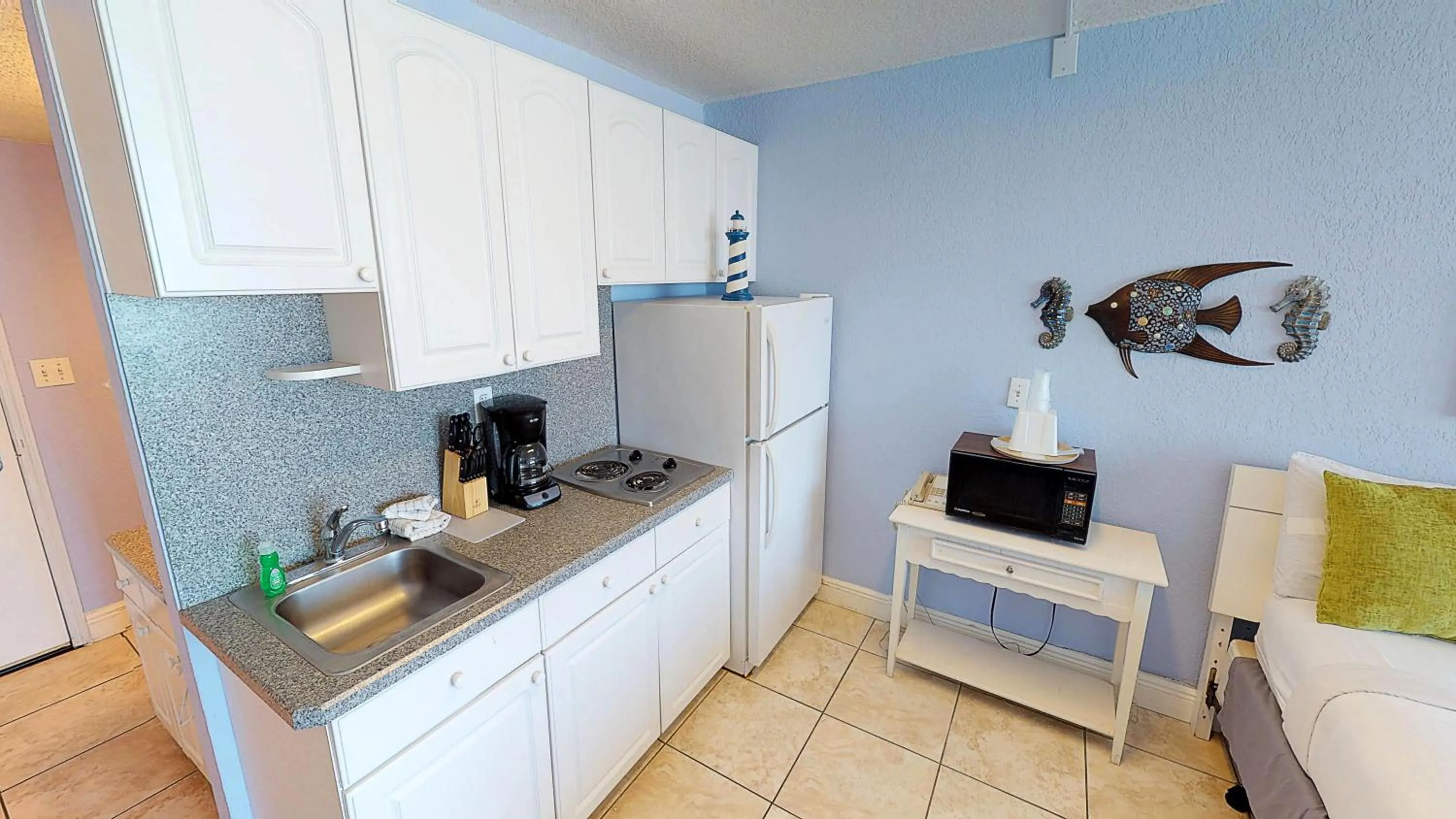 Kitchen or kitchenette in Island Inn Beach Resort