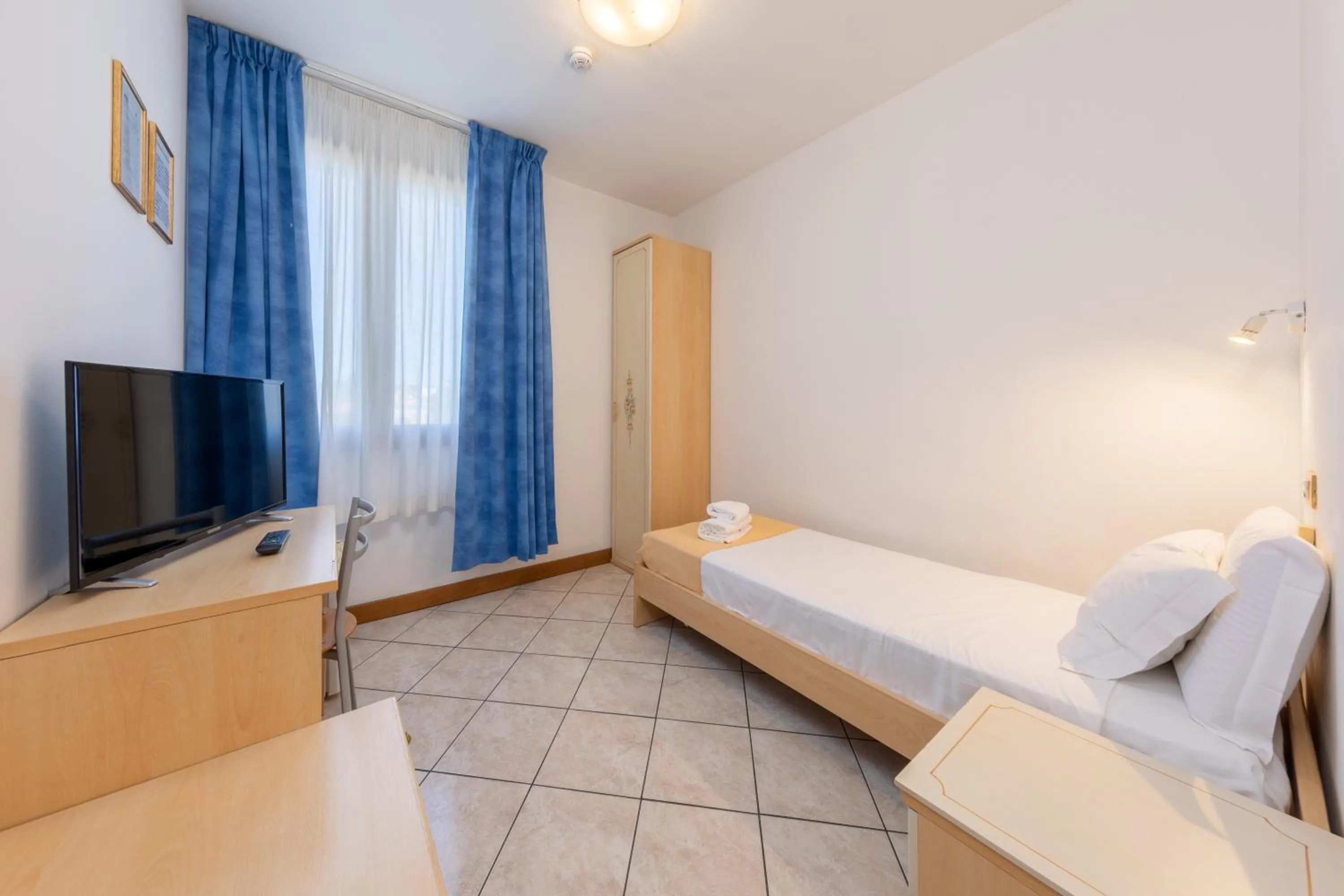 Bed in Hotel New Aurora Venice