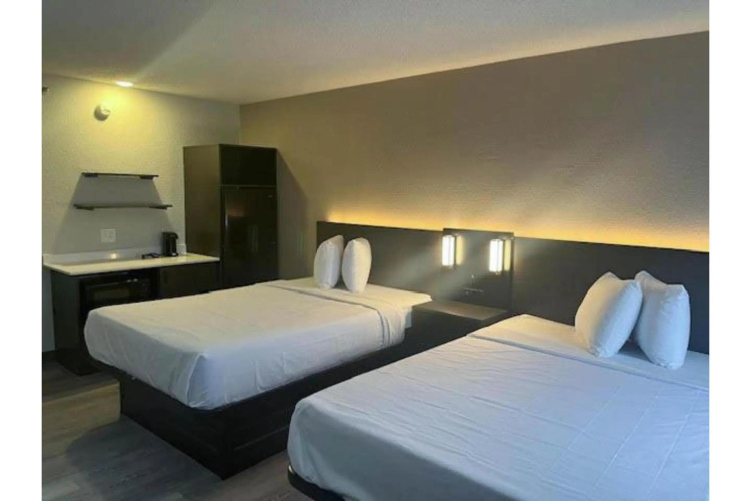 Bedroom, Bed in Studio 6 Suites Norcross, GA