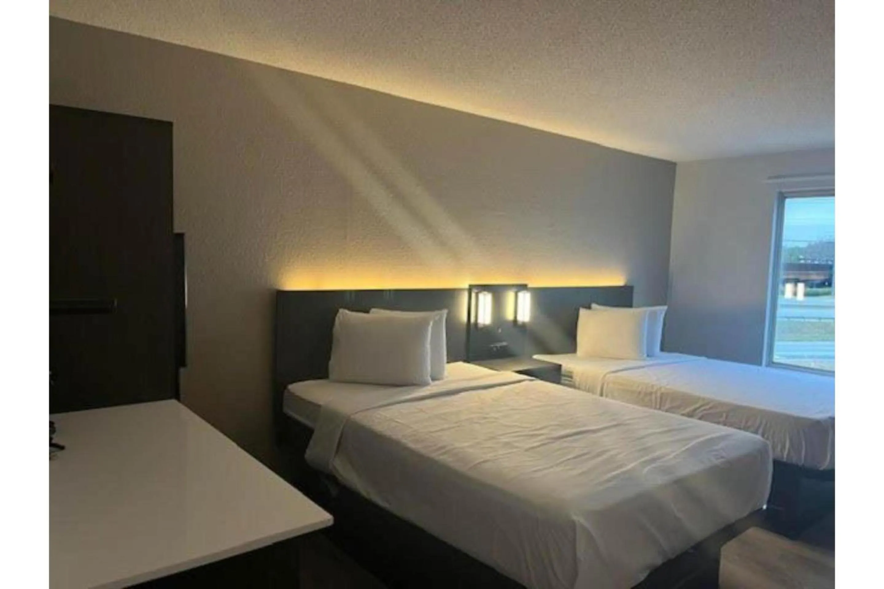 Bedroom, Bed in Studio 6 Suites Norcross, GA