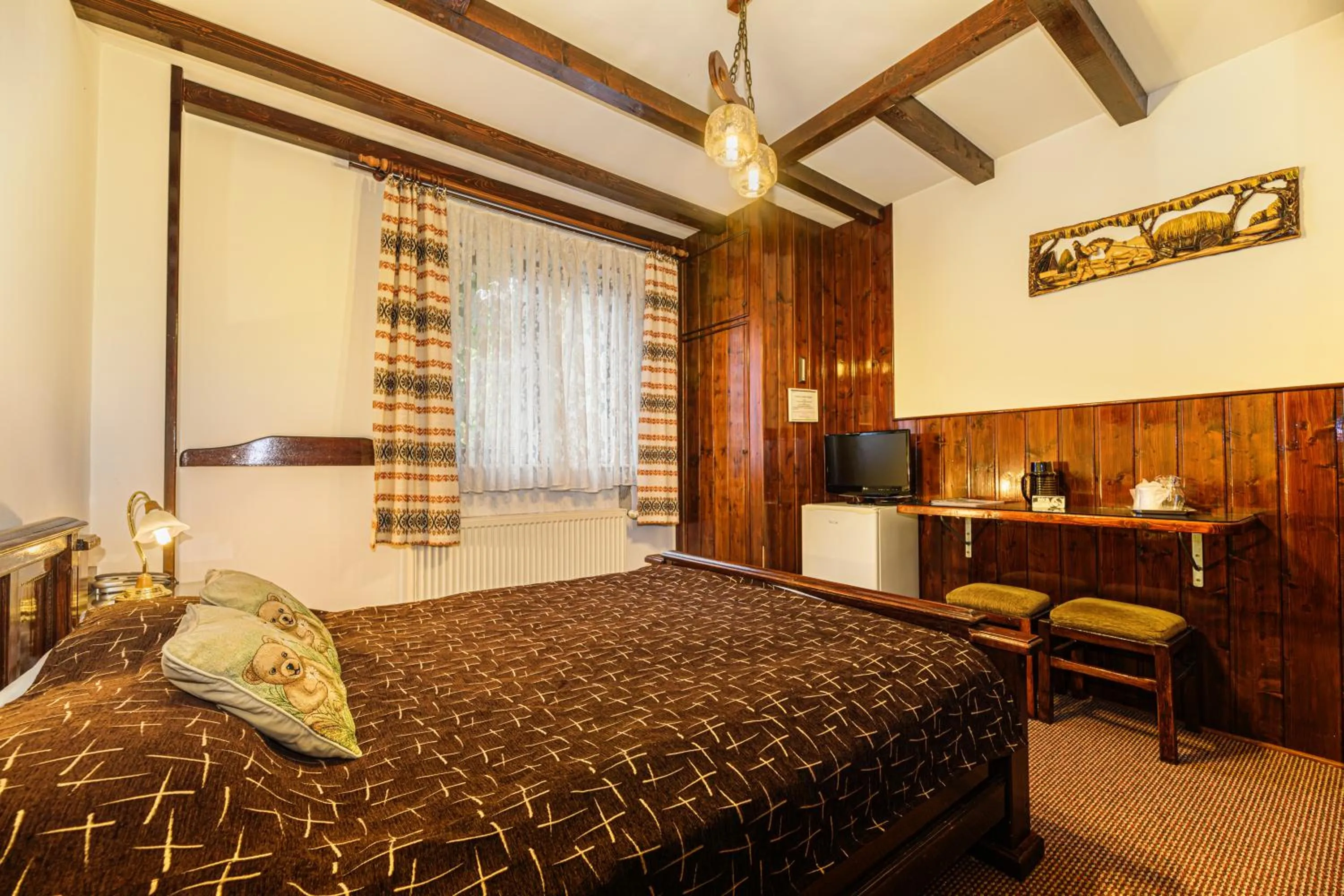 Bed in Pension Casa Bradul