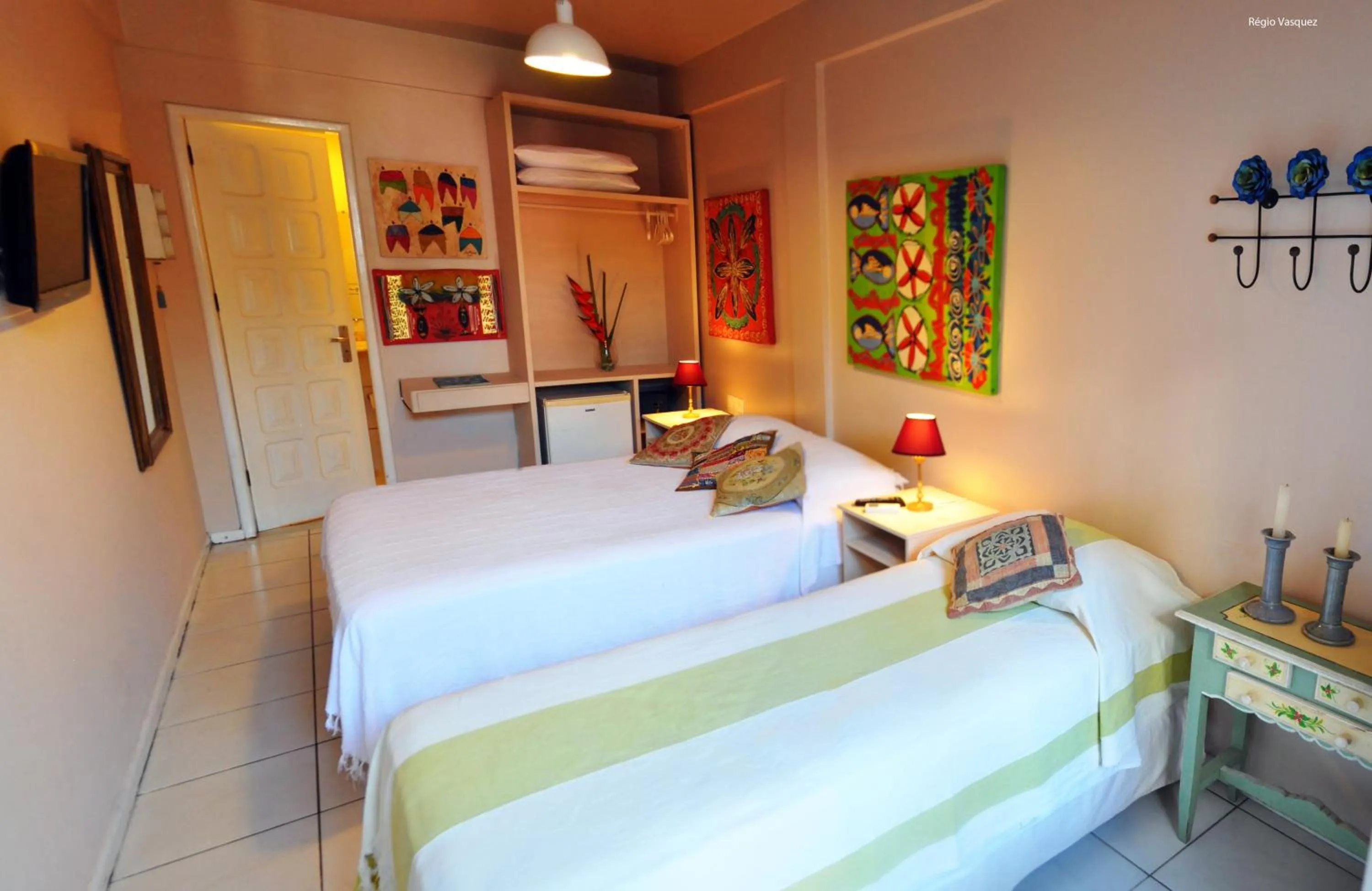 Bed in Pousada Via Brasil