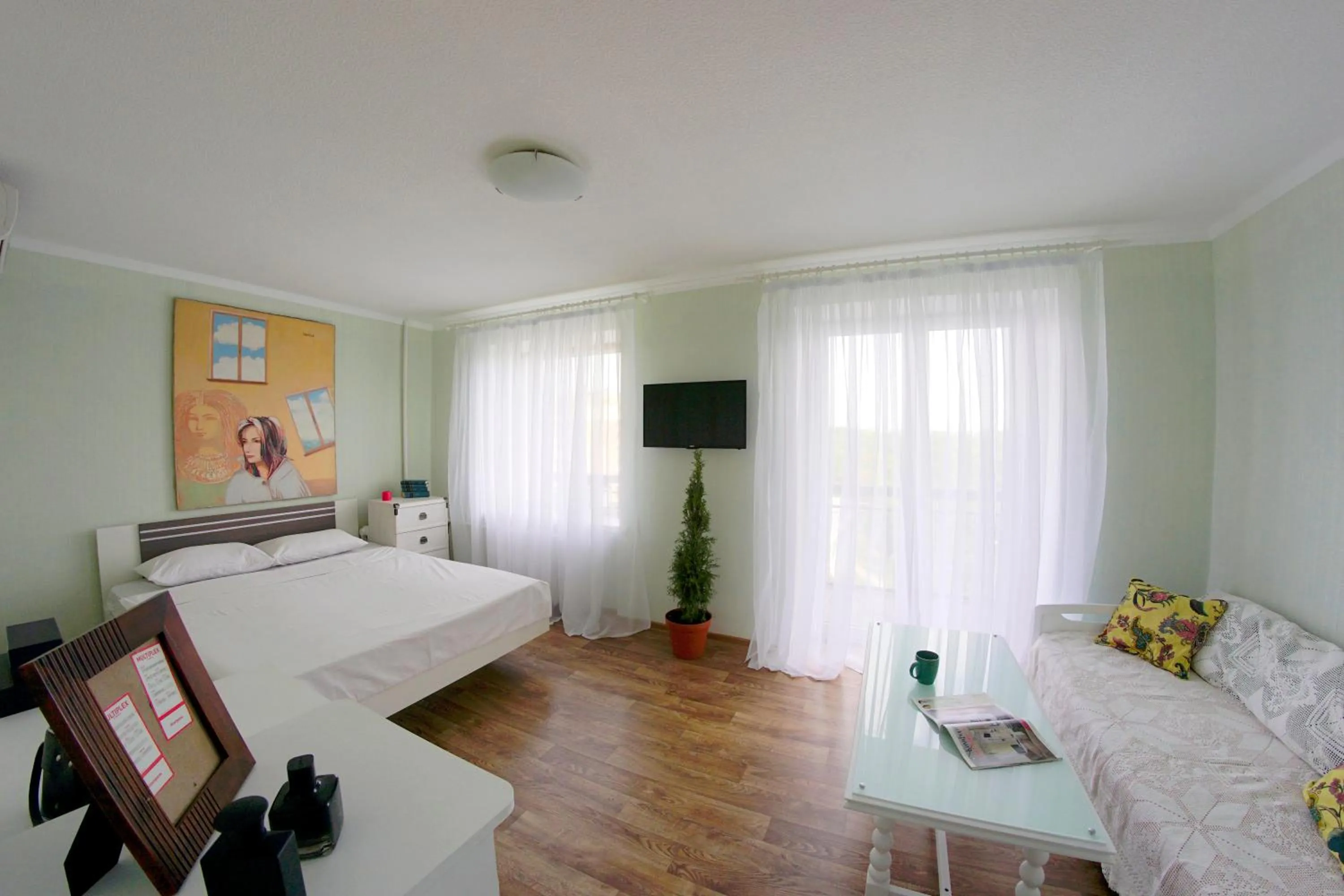 Communal lounge/ TV room, Bed in Flatsy at Botanichniy Sad underground