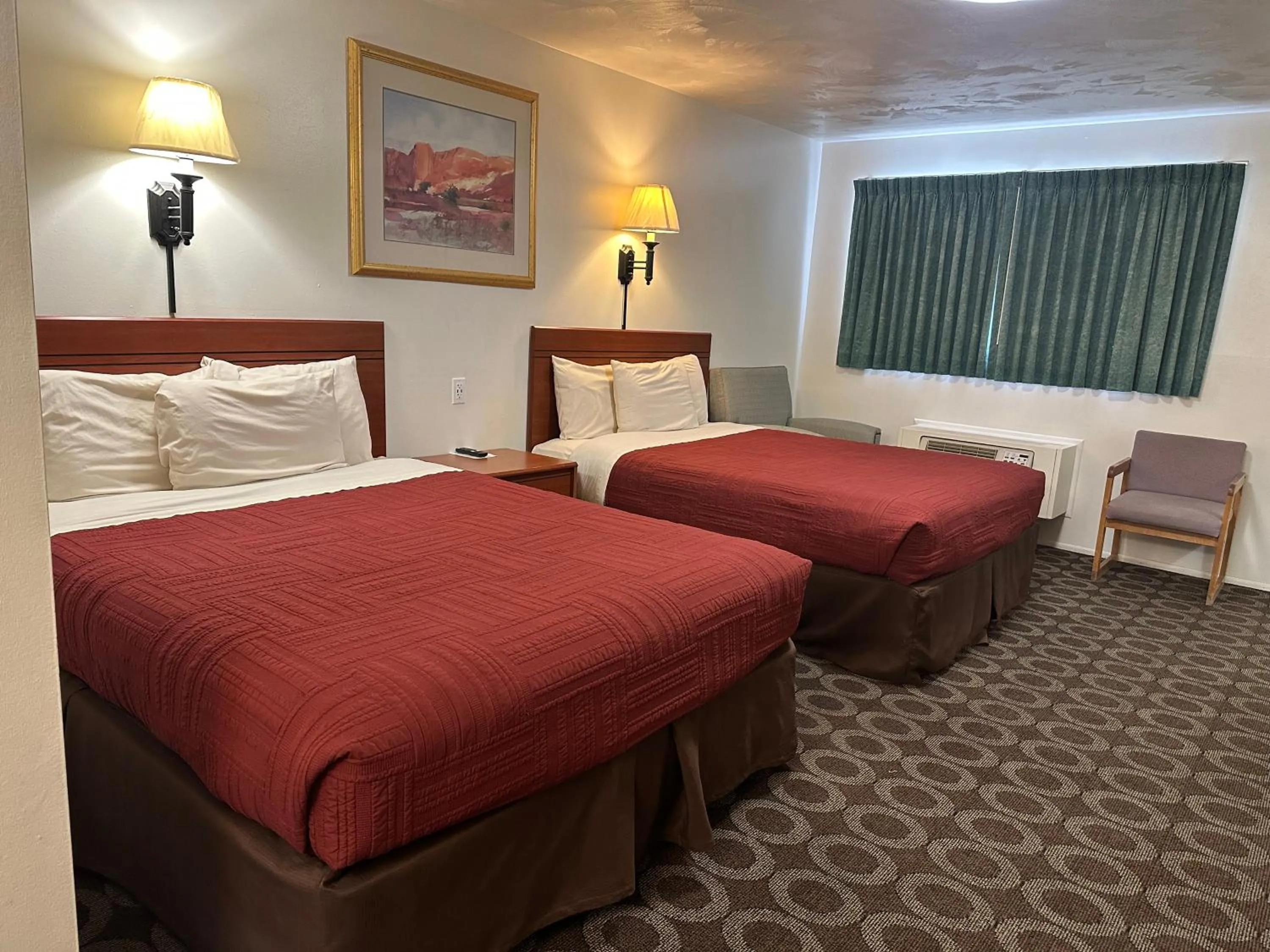 Bed in Canyonlands Motor Inn