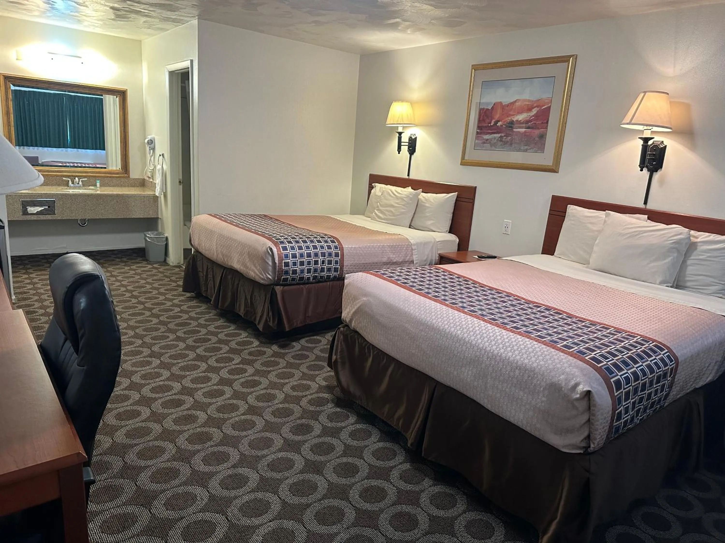Bed in Canyonlands Motor Inn