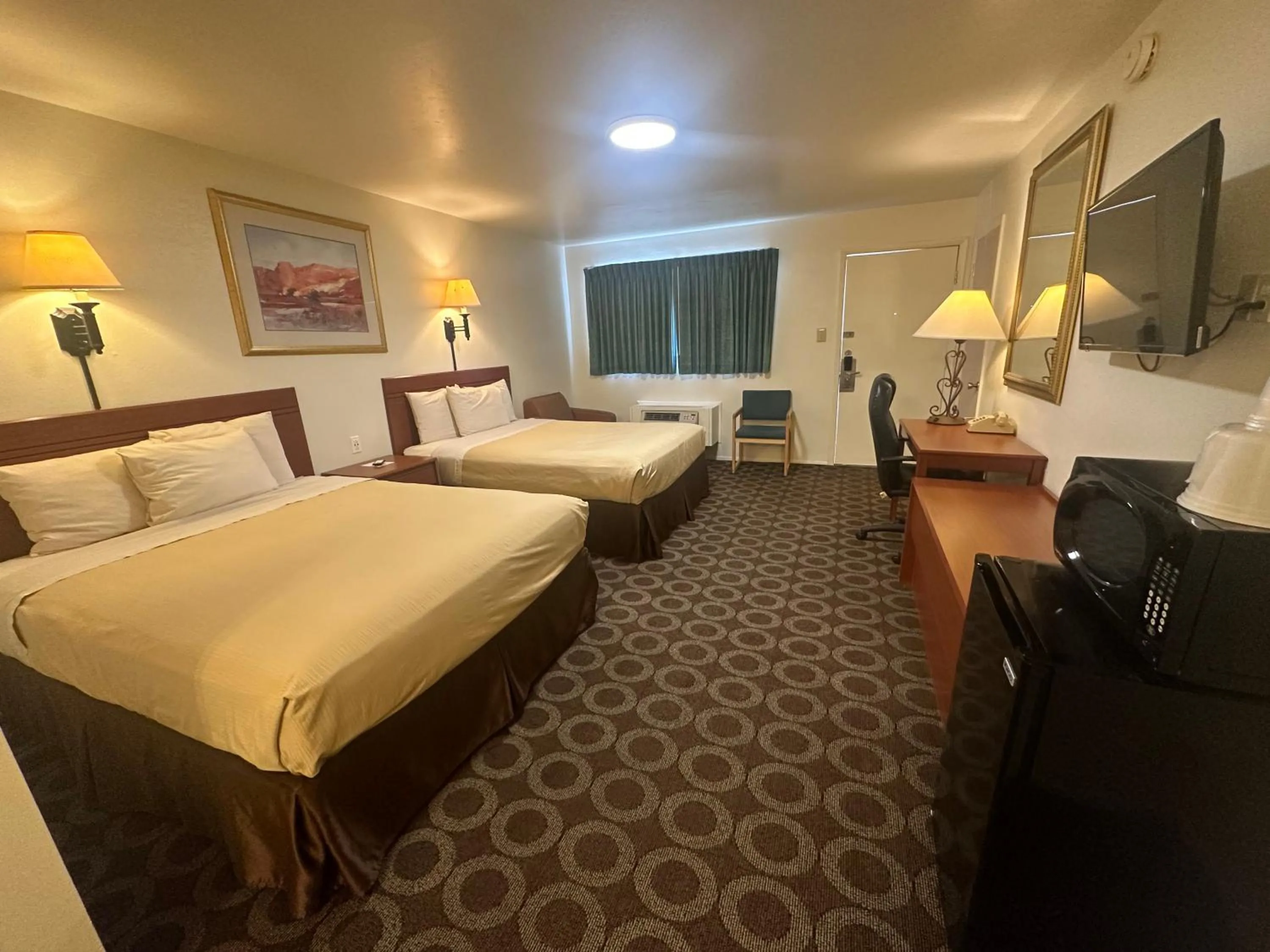 Bed in Canyonlands Motor Inn