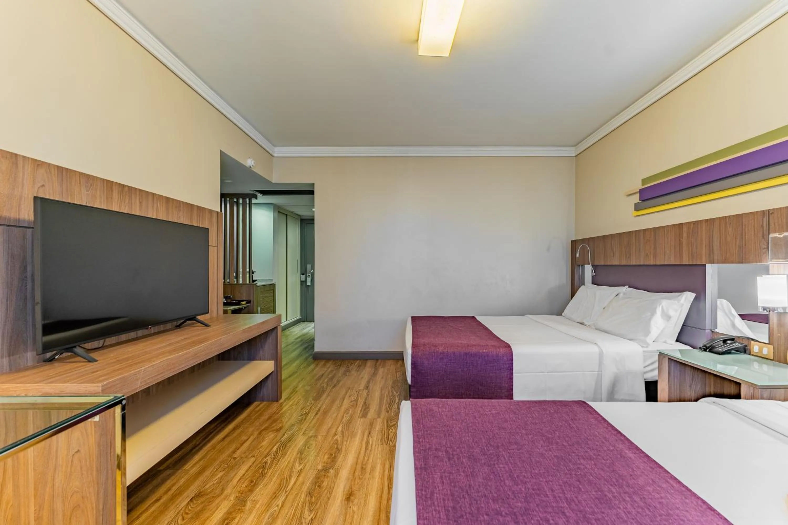 Bed in Grand Mercure Curitiba Rayon