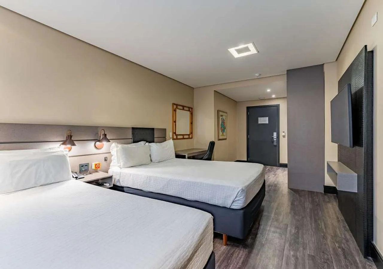 Photo of the whole room, Bed in Grand Mercure Curitiba Rayon