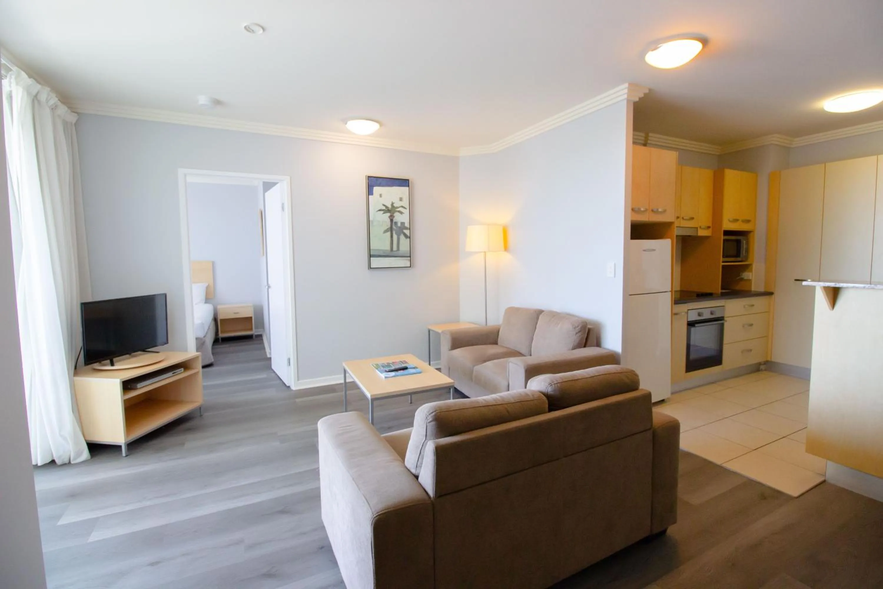 TV and multimedia in Caloundra Central Apartment Hotel Official