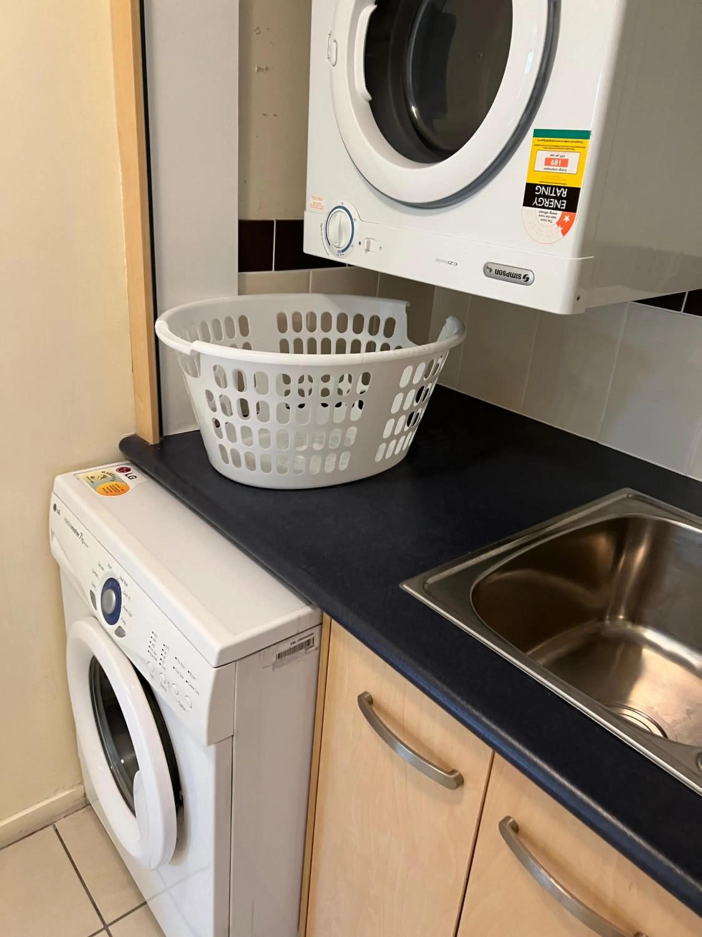 washing machine in Caloundra Central Apartment Hotel Official