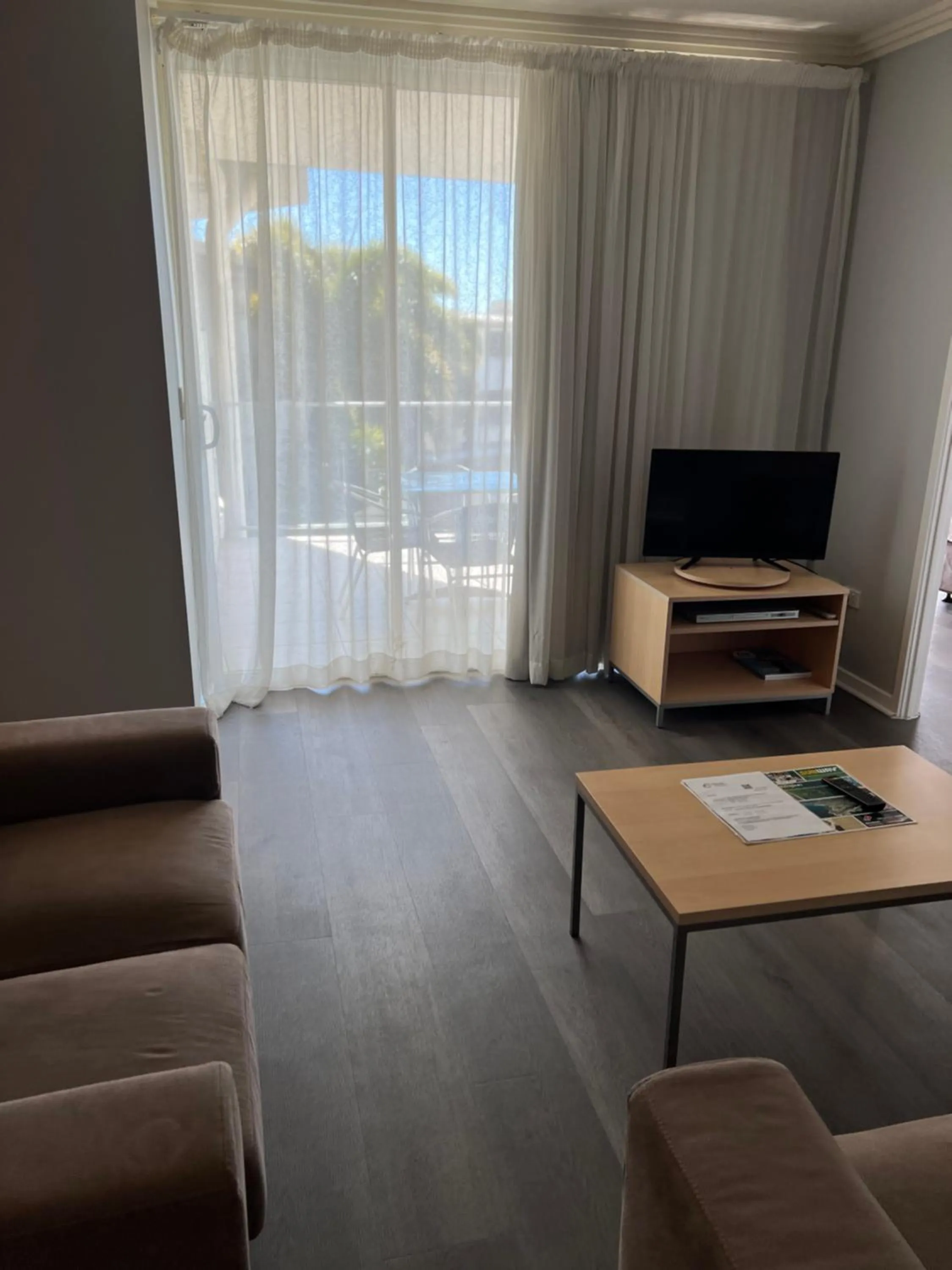 Living room in Caloundra Central Apartment Hotel Official