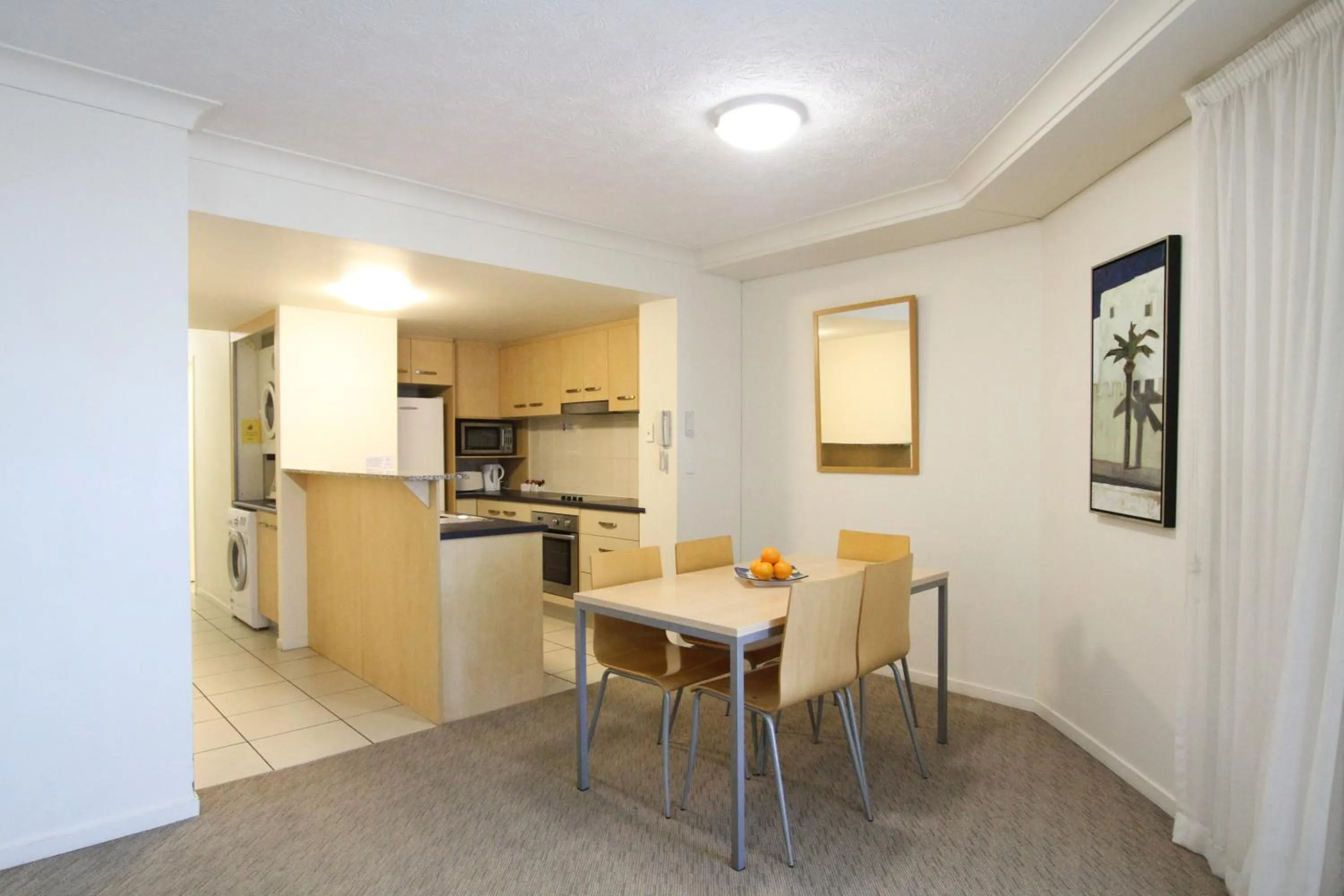 Kitchen or kitchenette in Caloundra Central Apartment Hotel Official