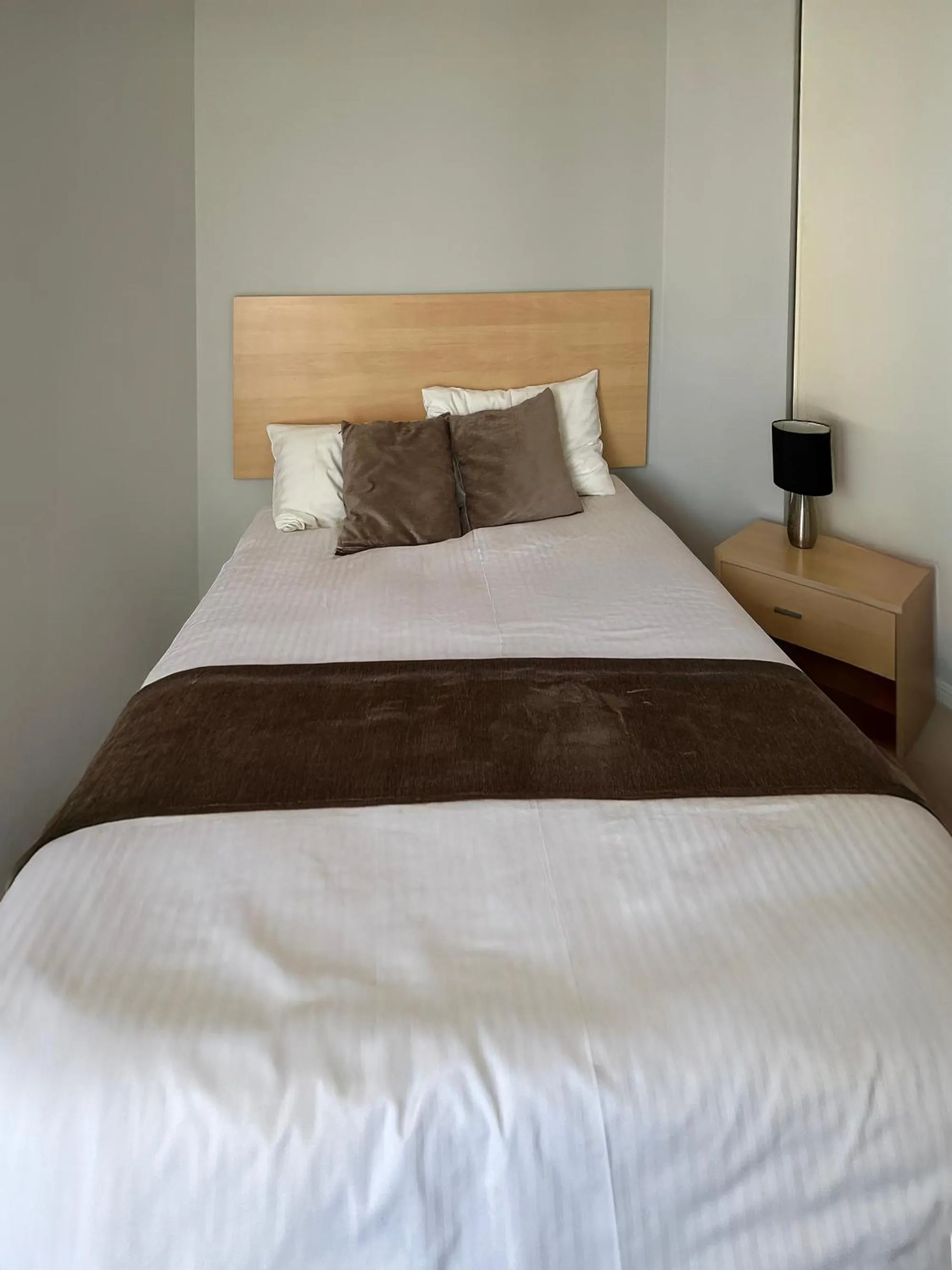 Bed in Caloundra Central Apartment Hotel Official