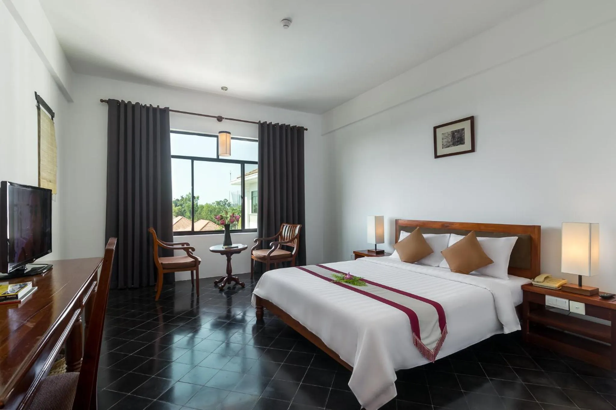 Photo of the whole room, Bed in Kingdom Angkor Hotel
