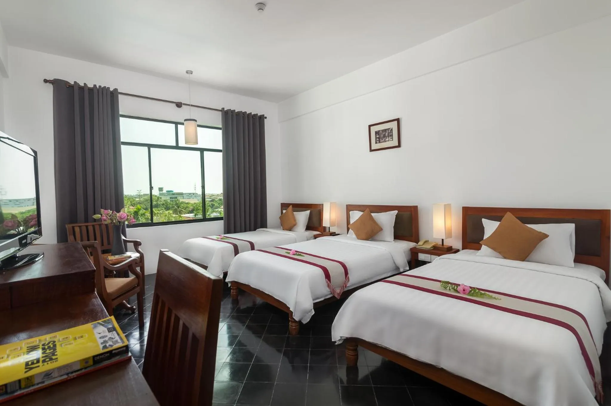Photo of the whole room, Bed in Kingdom Angkor Hotel