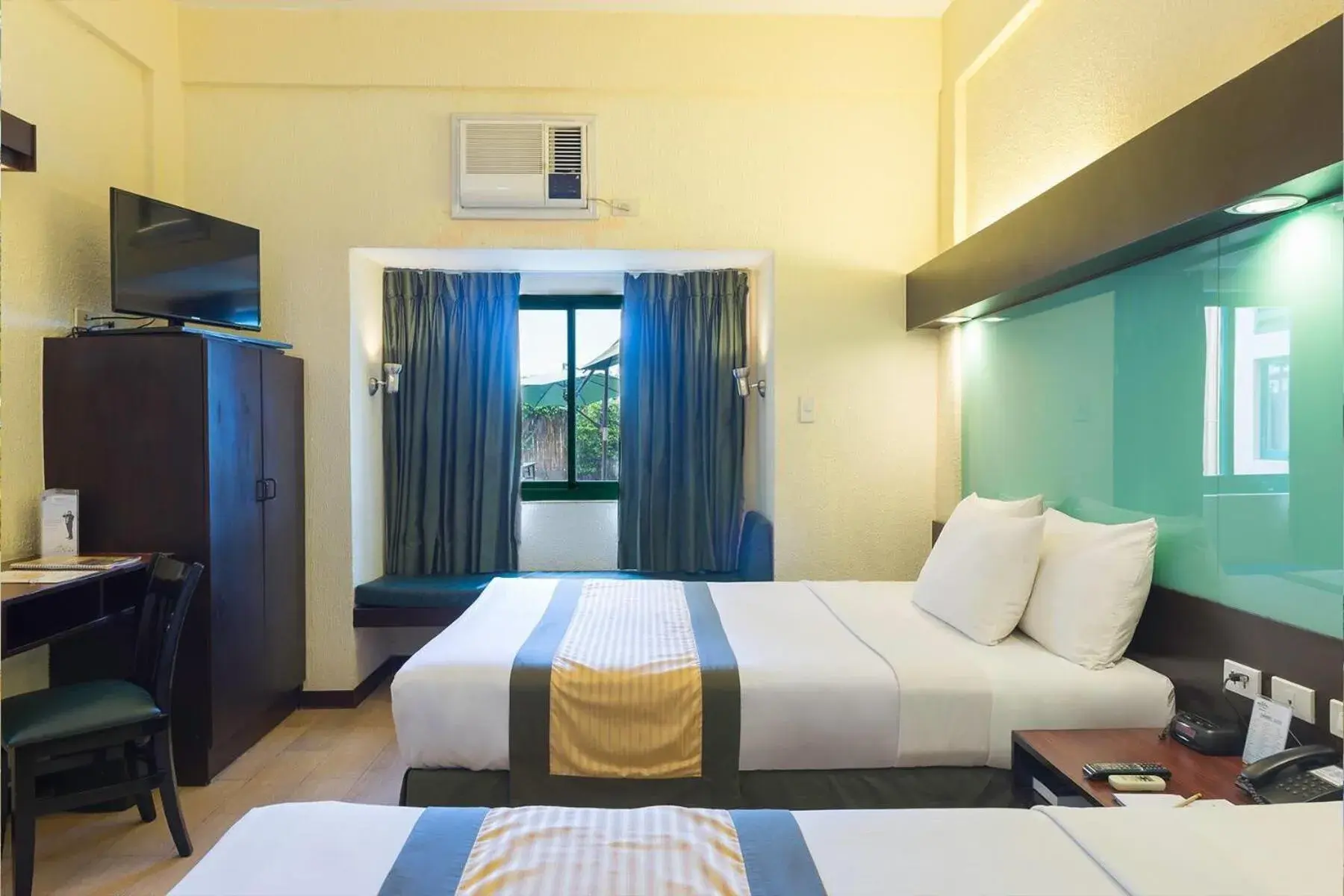 Photo of the whole room, Bed in Microtel by Wyndham Cabanatuan Photo of the whole room, Bed in Microtel by Wyndham Cabanatuan