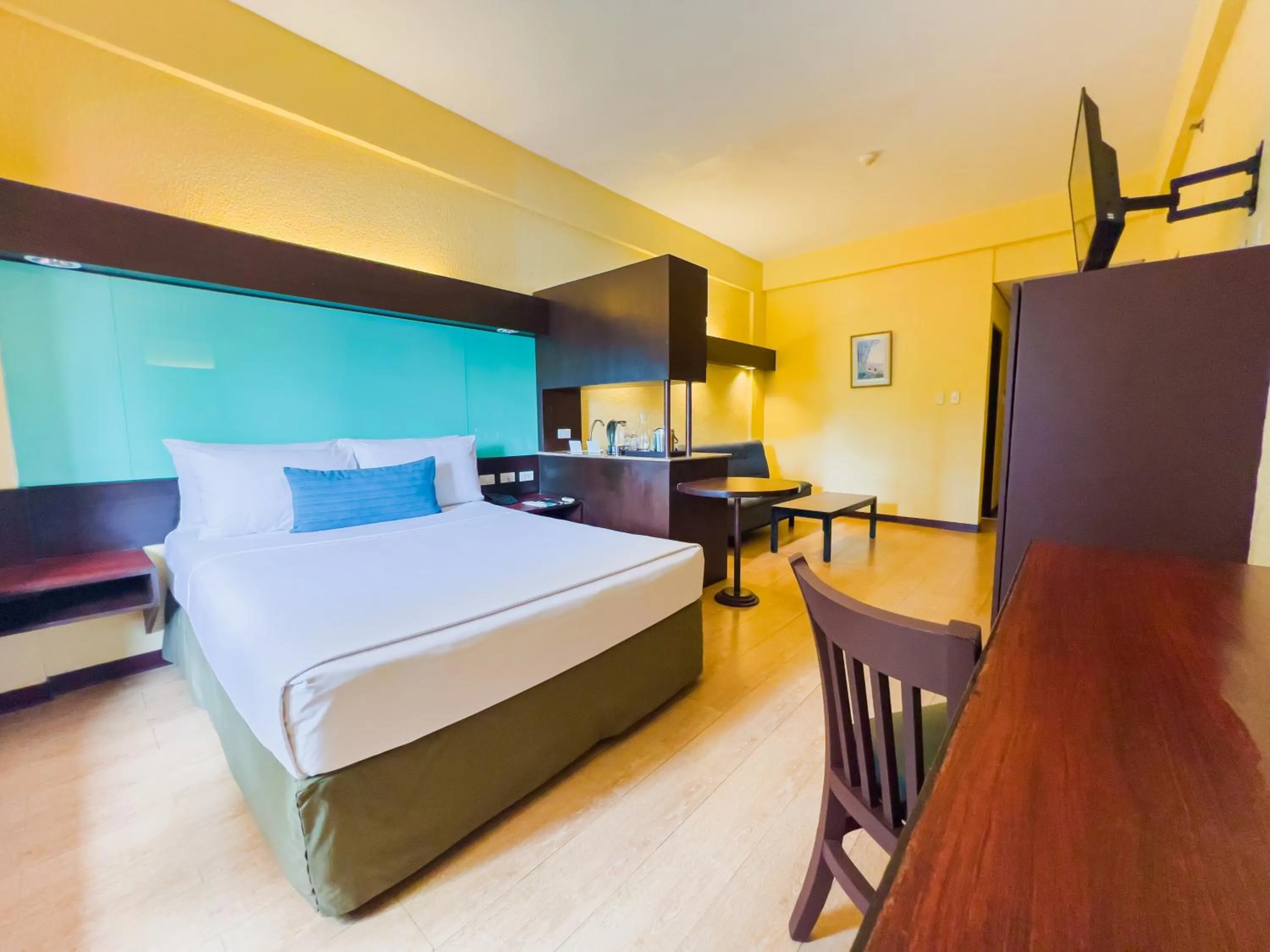 Bed in Microtel by Wyndham Cabanatuan